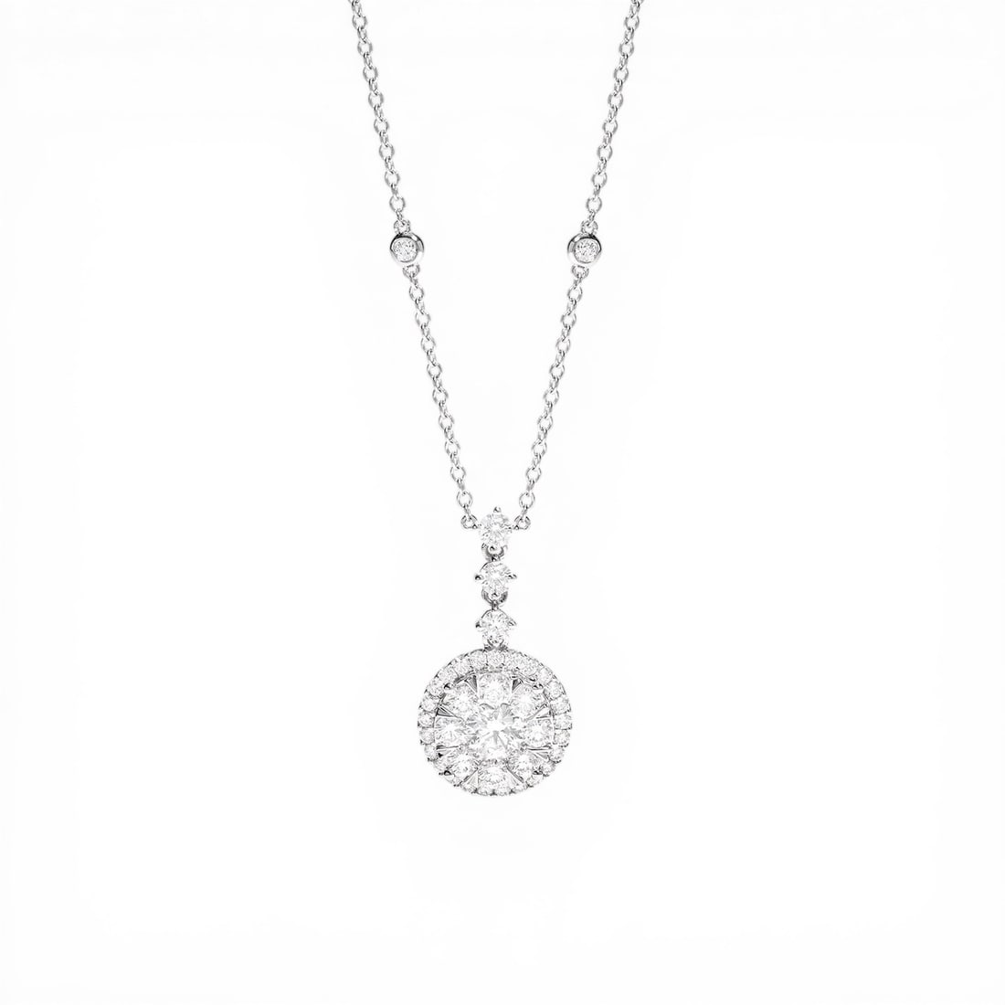 2.35 ctw Diamond Drop Cluster Pendant 18K White Gold Necklace: Defining modern elegance, this stunning Drop Cluster necklace featuring White Diamond captures the essence of style. Securely held in a classic Halo design, the necklace is forged from 4.4 g of high-p