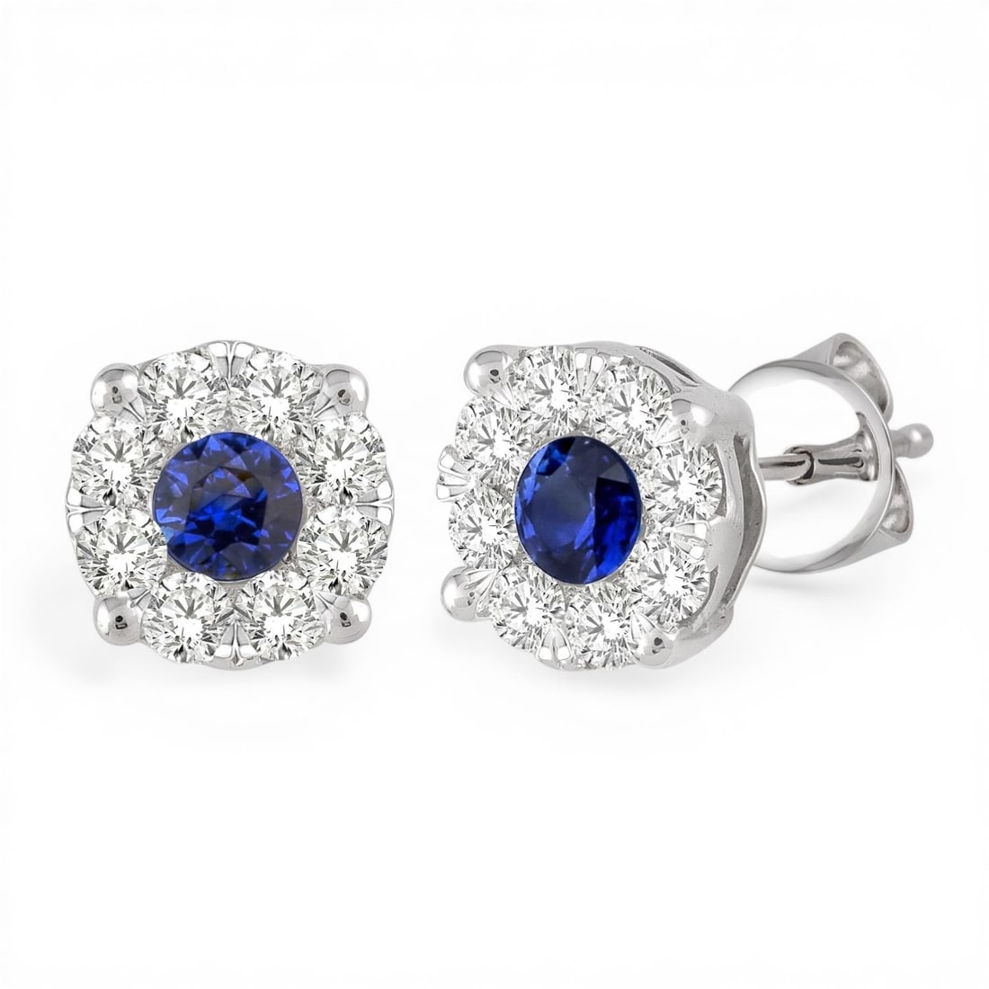 3.3mm Sapphire and 0.45 ctw Diamond 14K White Gold Earrings: A testament to superior craftsmanship, this stunning Cluster pair of earrings featuring Blue Sapphire, White Diamond is unparalleled. Crafted with precision, the Halo setting is seamlessly integrated