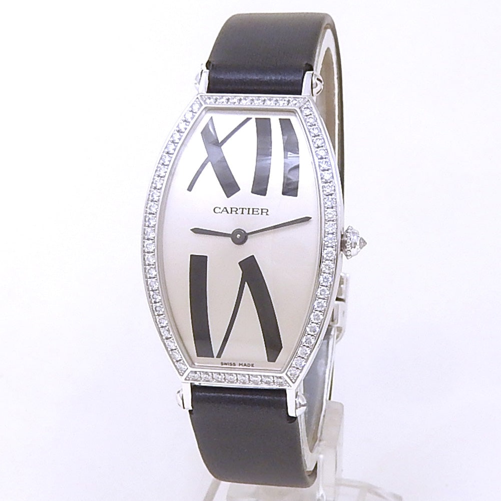 Cartier Tonneau WE400831 18k White Gold Silver Dial: The Cartier Tonneau, Reference WE400831, is an exquisite timepiece that embodies classic elegance. Crafted in radiant 18k White Gold, this watch features a captivating Silver dial that beautifully