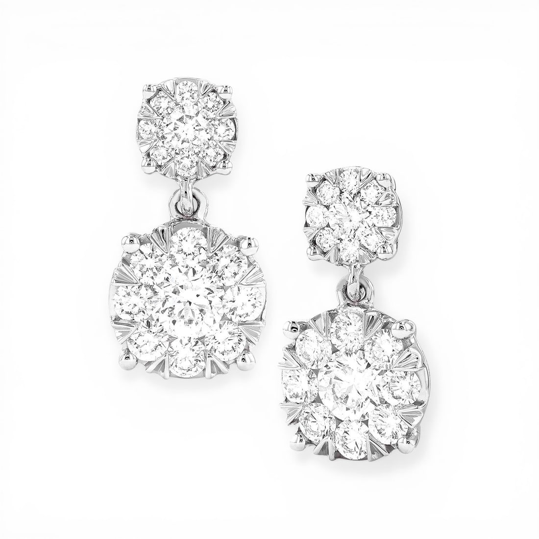 1.42 ctw White Diamond Fiori Drop Cluster 18K White Gold Earrings: Defining modern elegance, this stunning Fiori Drop Cluster pair of earrings featuring White Diamonds captures the essence of style. The gemstones are nestled within a Cluster framework, supported by a