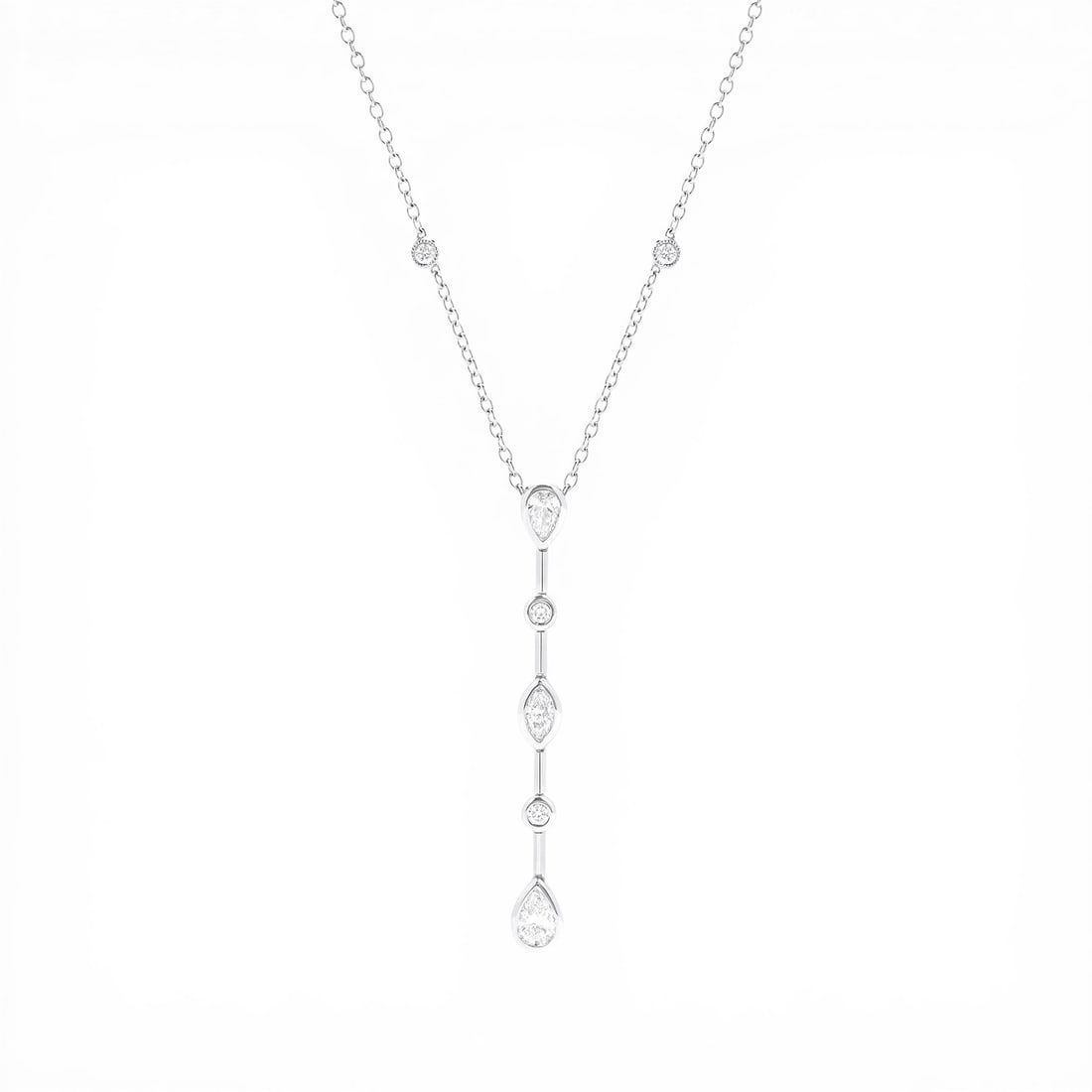 1.04 ctw Mixed Cut Diamond Bar Pendant 18K White Gold Necklace: Rare and radiant, this breathtaking Bar pendant necklace featuring White Diamonds offers a touch of the extraordinary. A detailed Bar gallery secures the stones, rendered in 2.05 grams of lustrous 18K