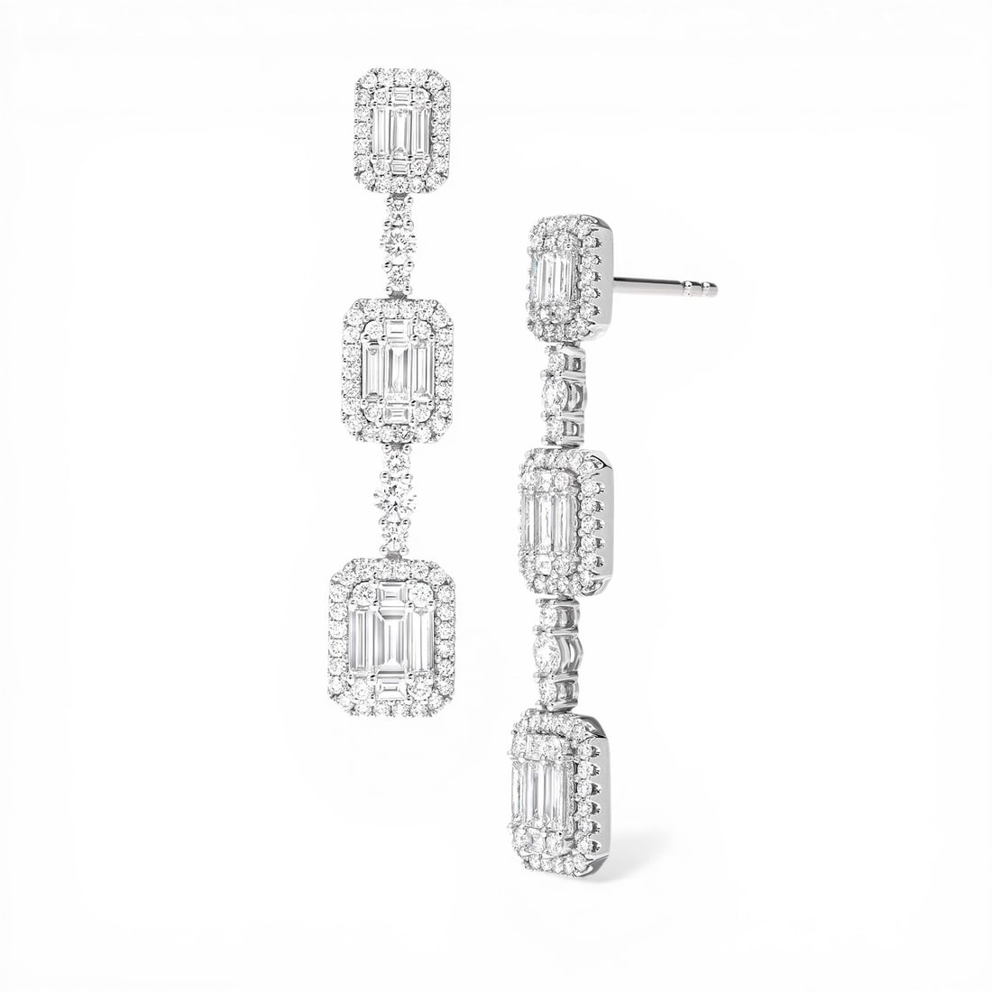 2.95 ctw Baguette and Round Diamond 18K White Gold Drop Earrings: Defining modern elegance, this breathtaking Empress Graduating Drop pair of earrings featuring Natural Diamonds captures the essence of style. Expertly mounted in a Drop setting, the earrings are craf