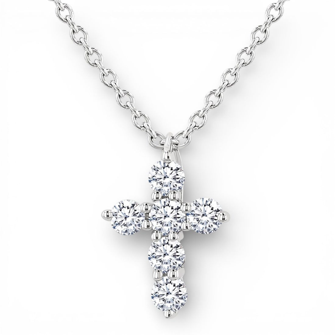0.15 ctw White Diamond Christian Cross 14K White Gold Pendant: Timeless and sophisticated, this elegant Cross pendant featuring White Diamond radiates enduring beauty. Securely held in a classic Cluster design, the pendant is forged from 0.2 grams of high-polish 
