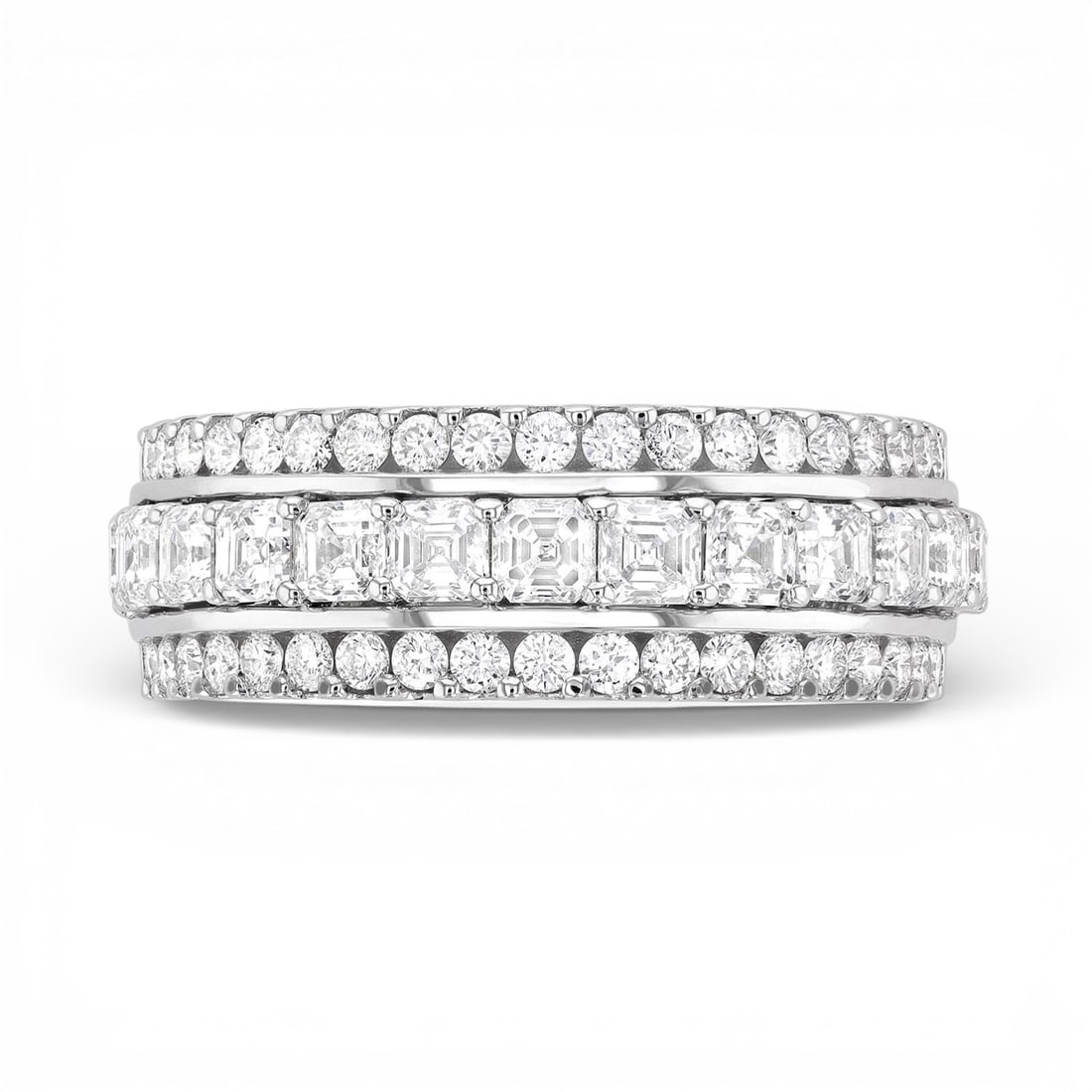1.85 ctw Diamond Duchess 3-Row 18K White Gold Band Ring: Captured in a moment of brilliance, this magnificent 3-Row ring featuring Natural Diamonds speaks to the connoisseur. Securely held in a classic Channel-Set design, the ring is forged from 7.0 grams o