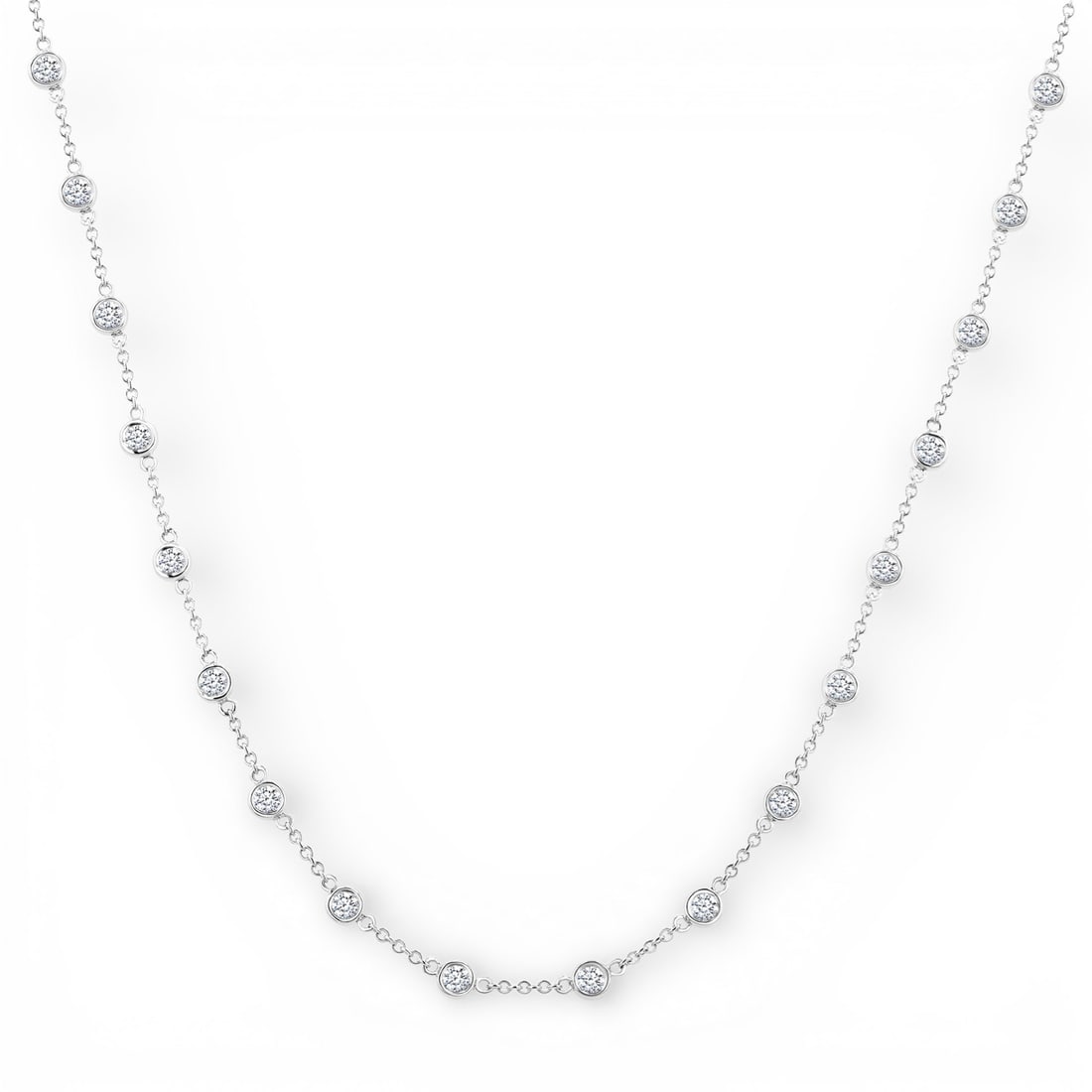 2.02 ctw Round Diamond Bezel Station 14K White Gold Necklace: Epitomizing grandeur, this breathtaking Bezel Set Station necklace featuring White Diamond stands as a beacon of refined taste. Crafted with precision, the Station setting is seamlessly integrated int