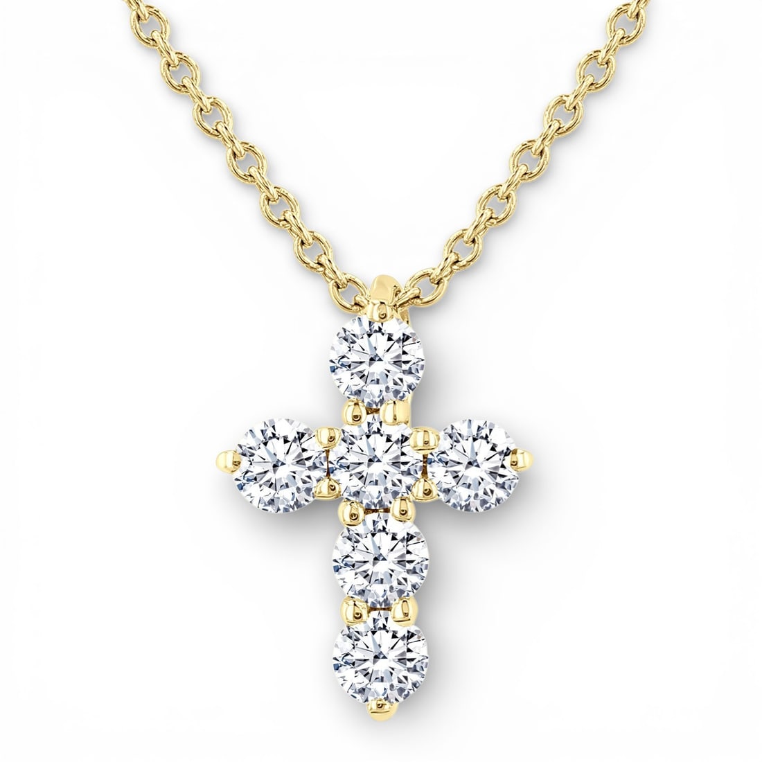 0.25 ctw Diamond Christian Cross Fashion 14K Yellow Gold Pendant: Rare and radiant, this elegant Christian Cross pendant featuring White Diamond offers a touch of the extraordinary. A detailed Cluster gallery secures the stones, rendered in 0.25 g of lustrous 14K Ye