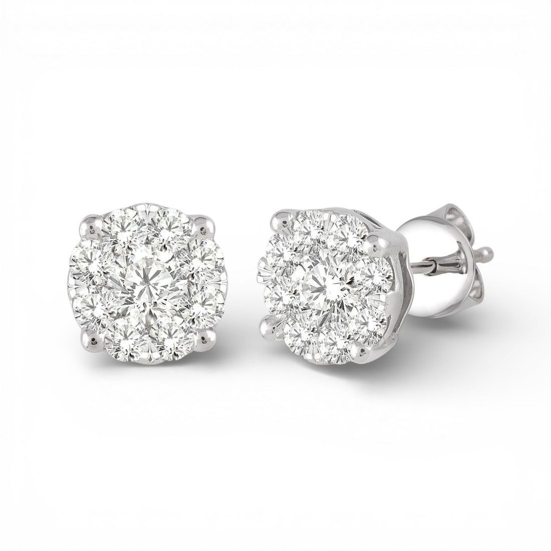 0.52 ctw Diamond Cluster 14K White Gold Stud Earrings: A symphony of light and color, this stunning Cluster pair of earrings featuring White Diamond embodies the pinnacle of luxury. Securely held in a classic Cluster design, the earrings are forged from 1