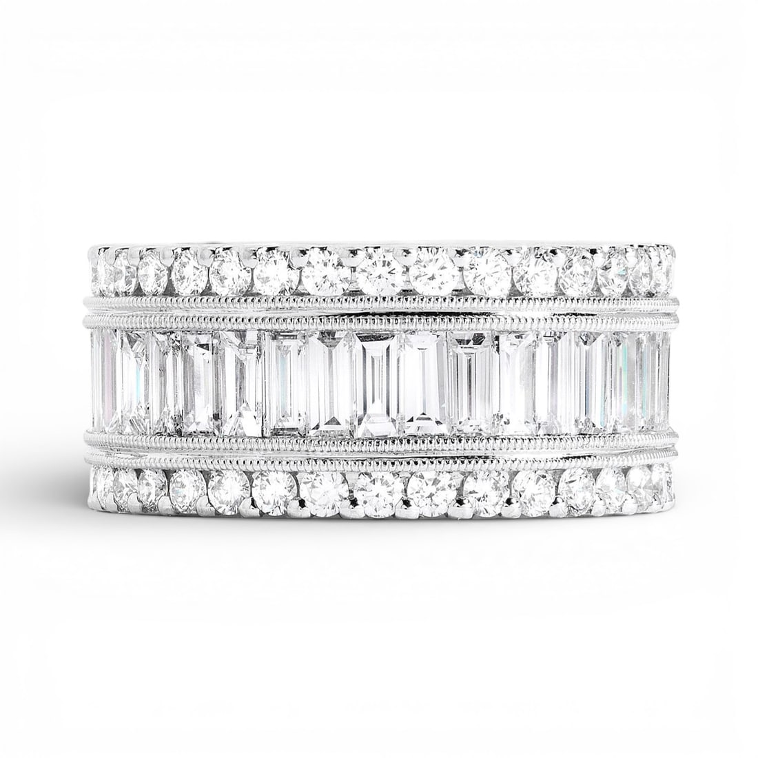 4.82 ctw Baguette and Round Diamond Eternity Band 18K White Gold: Timeless and sophisticated, this magnificent Eternity Band ring featuring White Diamond radiates enduring beauty. The gemstones are nestled within an Eternity Band framework, supported by a substantia