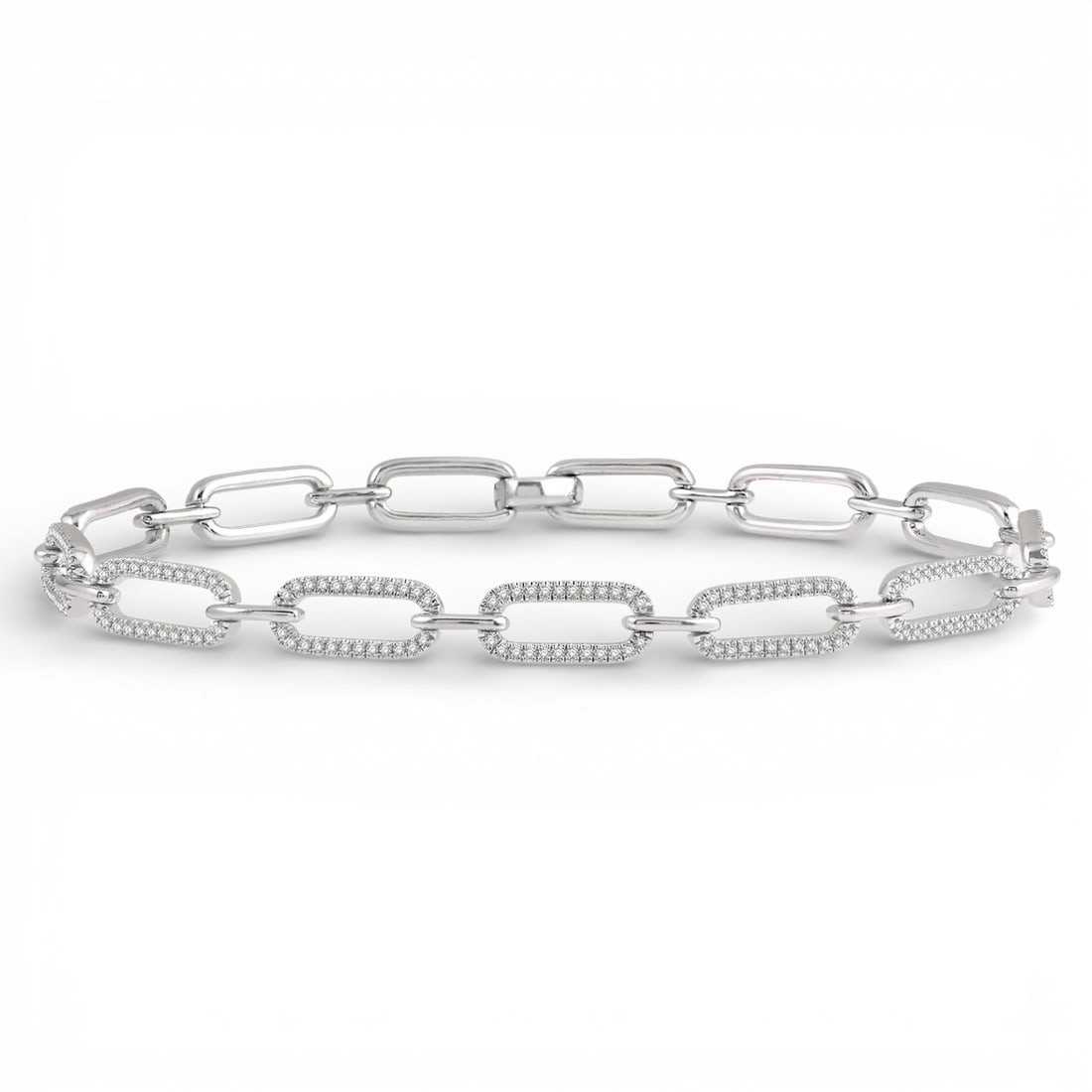 1.02 ctw White Diamond Paperclip 14K White Gold Bracelet: Exuding opulence and grace, this stunning Paperclip bracelet featuring White Diamond is crafted for the distinguished. A detailed Pave Link gallery secures the stones, rendered in 8.6 grams of lustrou