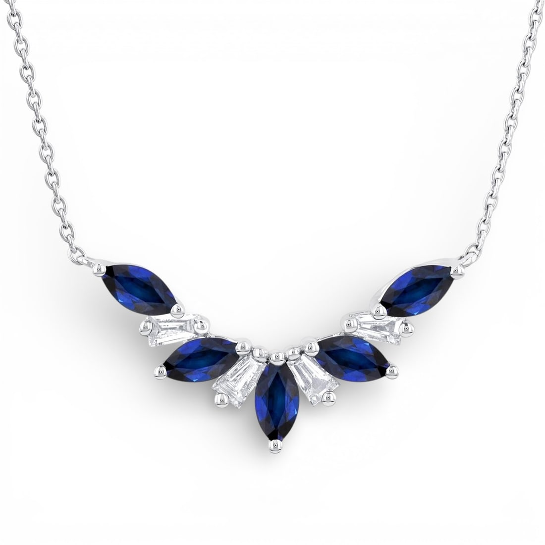 5x2.5mm Blue Sapphire and 0.18 ctw Diamond 14K White Gold Necklace: A symphony of light and color, this exquisite Marquise necklace featuring Blue Sapphire, White Diamond embodies the pinnacle of luxury. The gemstones are nestled within a Cluster framework, supported 