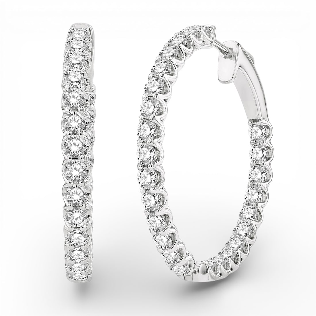3.0 ctw White Diamond Inside-Out 14K White Gold Hoop Earrings: Exuding opulence and grace, this breathtaking Inside-Out Hoop pair of earrings featuring White Diamonds is crafted for the distinguished. Crafted with precision, the Hoop setting is seamlessly integra