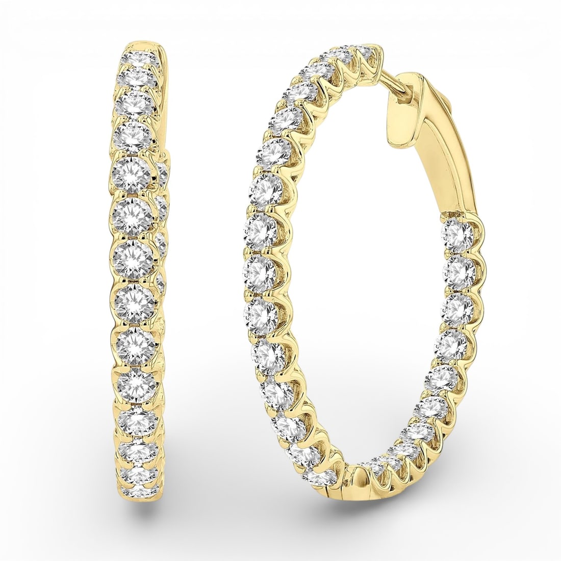 3.0 ctw Inside-Out Diamond Hoop Earrings 14K Yellow Gold: Captured in a moment of brilliance, this stunning Inside-Out Hoop pair of earrings featuring White Diamond speaks to the connoisseur. The gemstones are nestled within a Continuous Line framework, supp