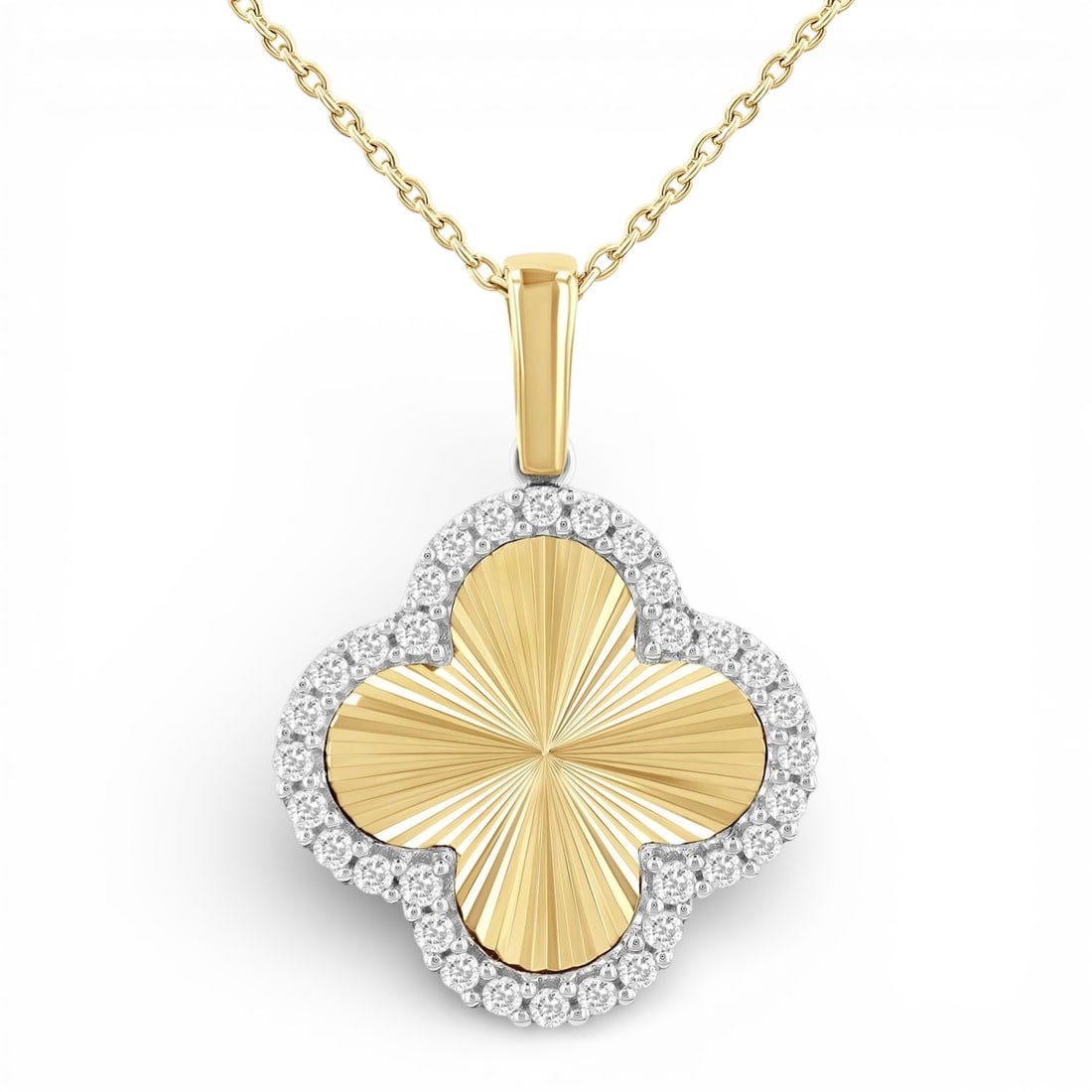 0.25 ctw White Diamond Clover Fluted 14K Yellow & White Gold Pendant: Timeless and sophisticated, this elegant Clover pendant featuring White Diamond radiates enduring beauty. The gemstones are nestled within a Halo framework, supported by a substantial 2.6 grams 14K Ye