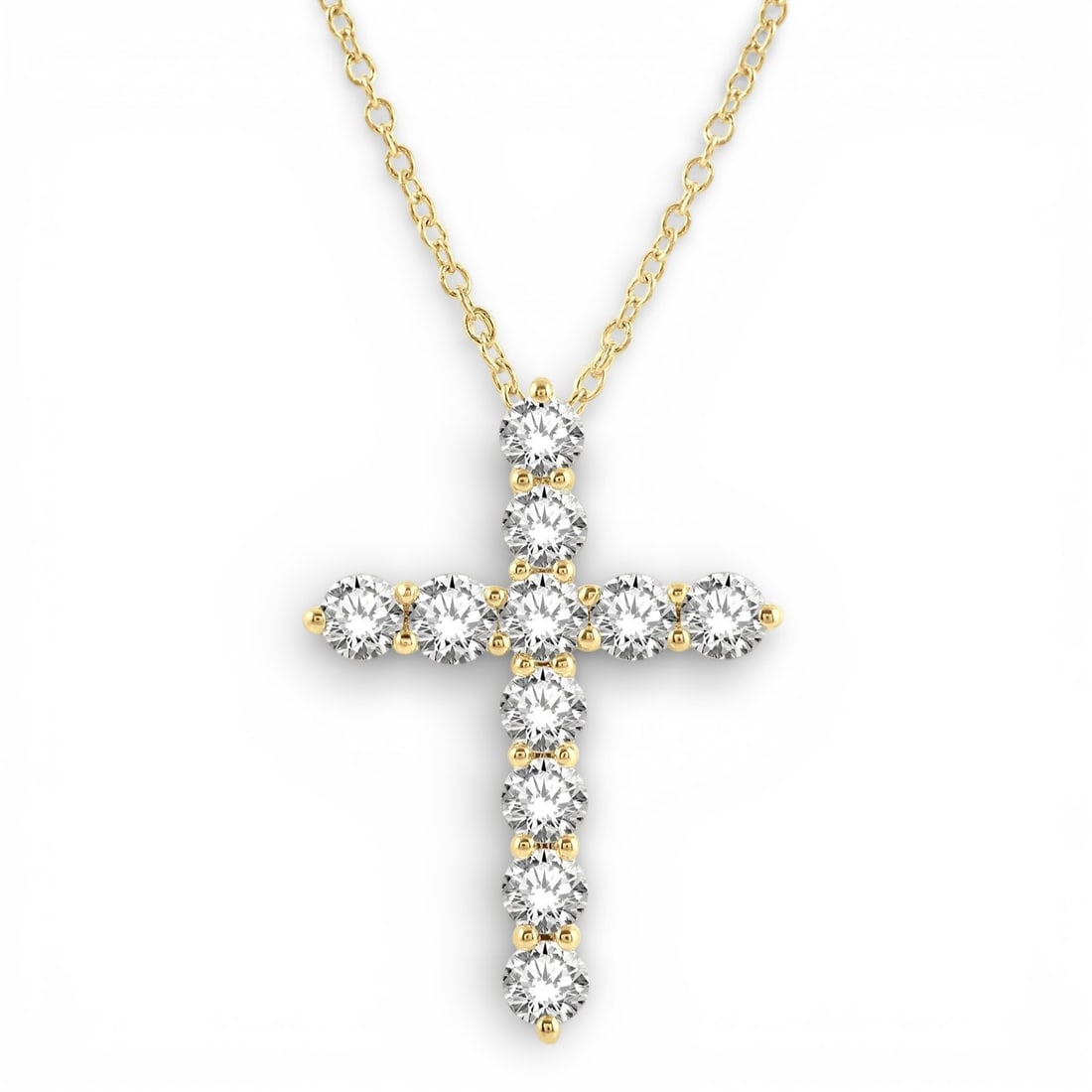 2.97 ctw Diamond Latin Cross Pendant 14k Yellow Gold: Epitomizing grandeur, this magnificent Latin Cross pendant featuring White Diamond stands as a beacon of refined taste. Showcasing the gems in a Single Row arrangement, the pendant consists of 2.2 gra