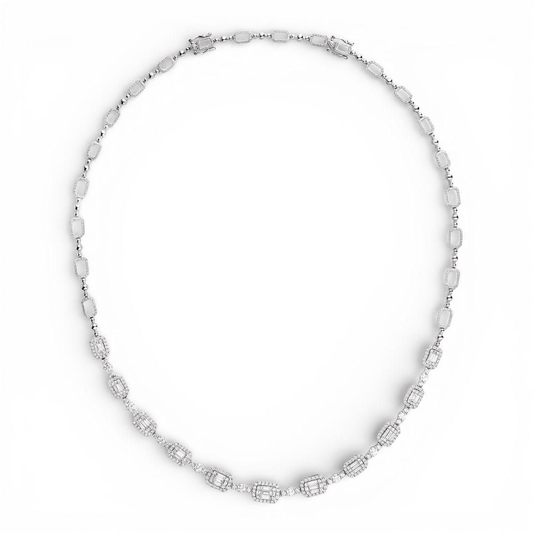4.09 ctw Diamond Station 18K White Gold Necklace: Rare and radiant, this breathtaking Empress necklace featuring White Diamond offers a touch of the extraordinary. A detailed Station gallery secures the stones, rendered in 29.25 grams of lustrous 18K
