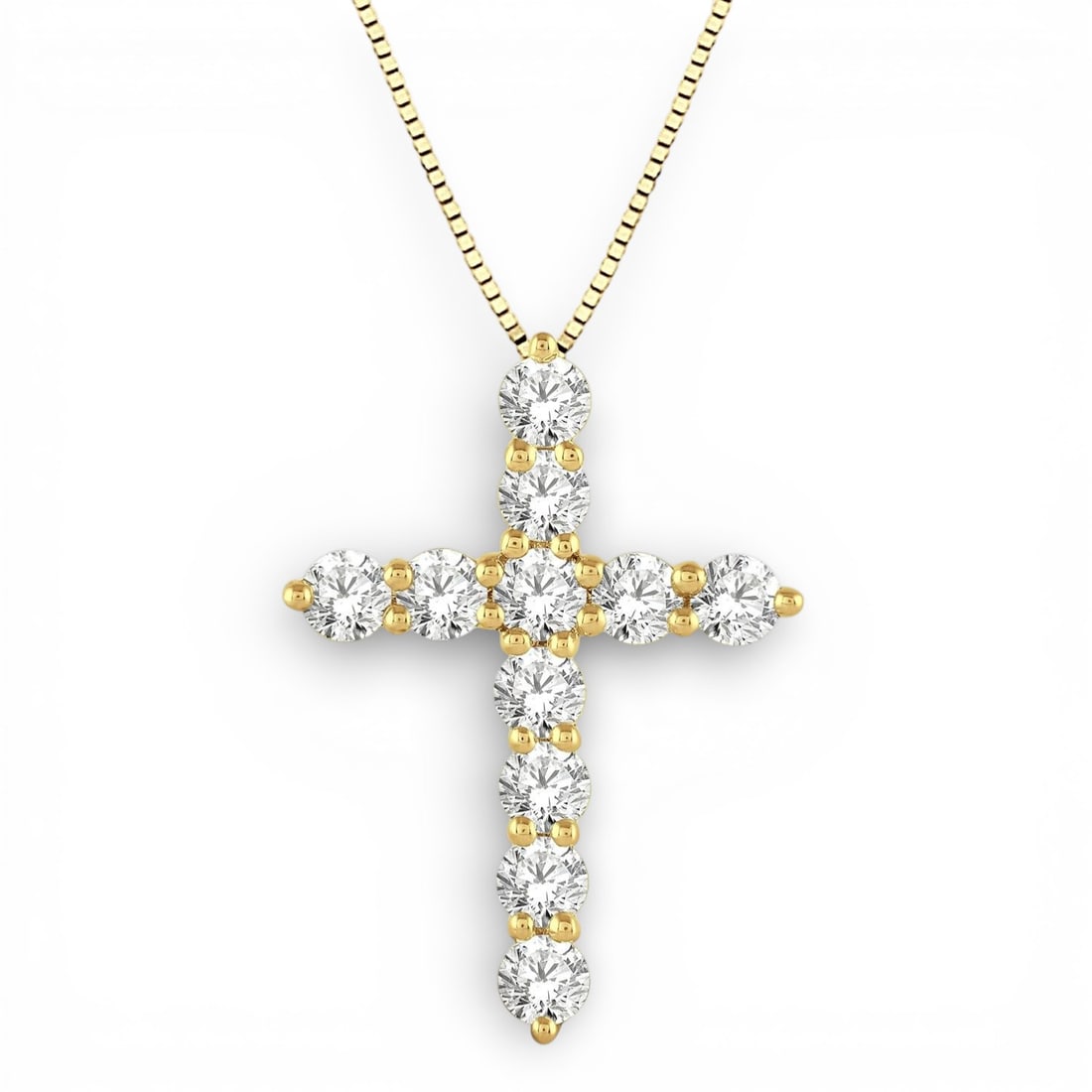 1.0 ctw Round Cut Diamond Cross Pendant 14K Yellow Gold: Rare and radiant, this elegant Cross pendant featuring White Diamond offers a touch of the extraordinary. A detailed Prong gallery secures the stones, rendered in 0.9 g of lustrous 14K Yellow Gold. Th