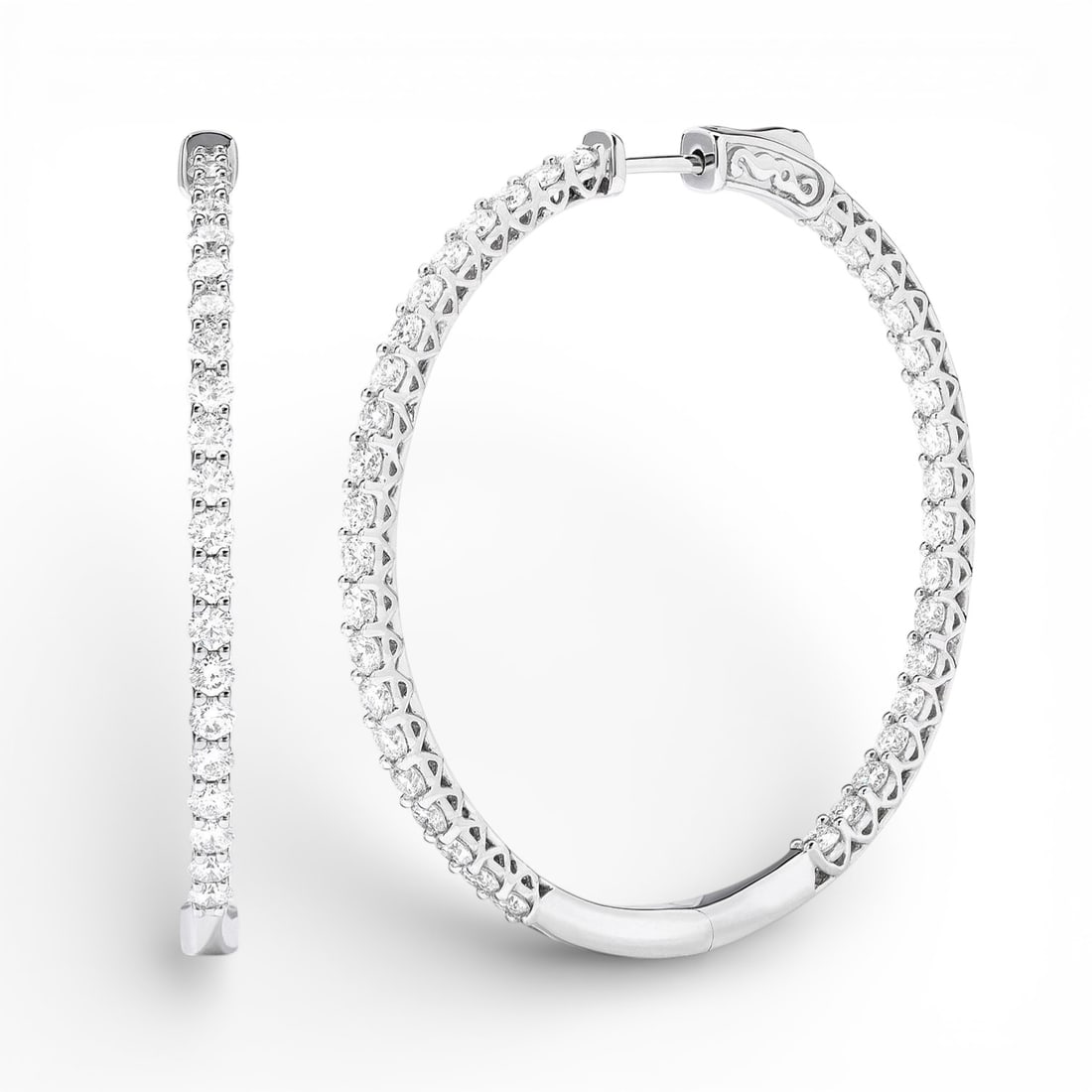 Duchess Classic 3.53 ctw White Diamond 18K White Gold Hoop Earrings: An exquisite masterpiece of haute joaillerie, this breathtaking Classic pair of earrings featuring White Diamonds is a true treasure. Crafted with precision, the Shared Prong Setting is seamlessly int
