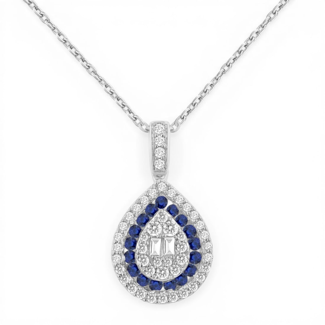0.27 ctw Diamond & Sapphire Halo Pear 14K White Gold Pendant: An exquisite masterpiece of haute joaillerie, this stunning Pear Shape pendant featuring White Diamond, Blue Sapphire is a true treasure. A detailed Halo gallery secures the stones, rendered in 1.4 gr