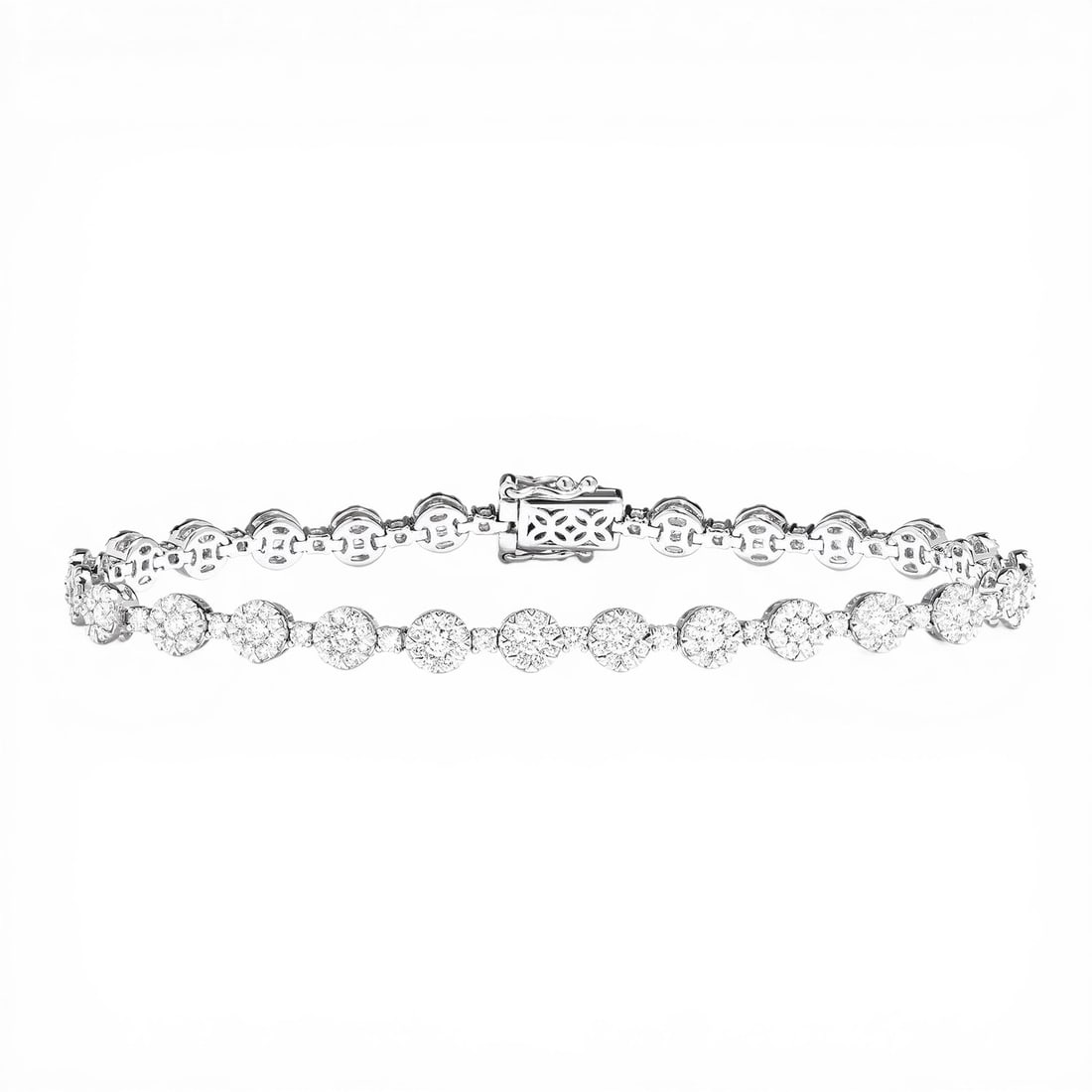 3.99 ctw White Diamond Fiori Station 18K White Gold Tennis Bracelet: A symphony of light and color, this breathtaking Fiori Station bracelet featuring Natural Diamonds embodies the pinnacle of luxury. Securely held in a classic Cluster design, the bracelet is forged fr