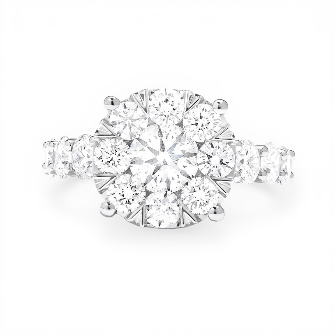3.06 ctw White Diamond Fiori Cluster Cocktail 18K White Gold Ring: Epitomizing grandeur, this exquisite Fiori Cluster ring featuring White Diamonds stands as a beacon of refined taste. Showcasing the gems in a Cluster arrangement, the ring consists of 6.45 grams of 1