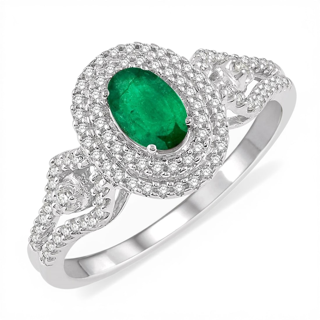 6x4mm Emerald and 0.30 ctw Diamond 14K White Gold Ring: Epitomizing grandeur, this magnificent Double Halo ring featuring Emerald, White Diamond stands as a beacon of refined taste. A detailed Double Halo gallery secures the stones, rendered in 3.5 grams o