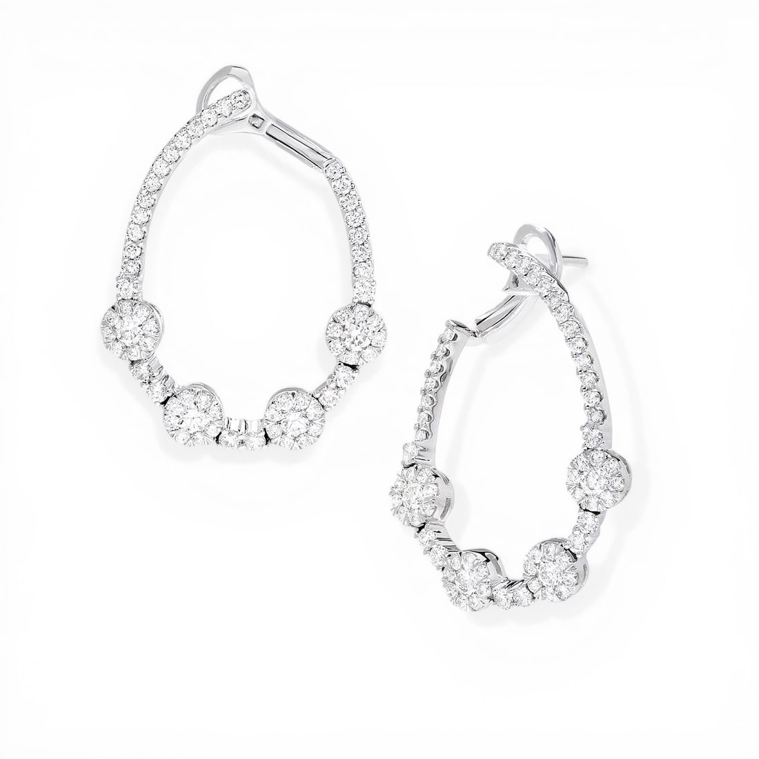 2.02 ctw White Diamond Fiori Round Station Hoop Cluster 18K White Gold Earrings: A vision of luxury, this stunning Fiori Round Station Hoop Cluster pair of earrings featuring White Diamond defines sophistication. The gemstones are nestled within a Diamond Cluster Hoop framework, s