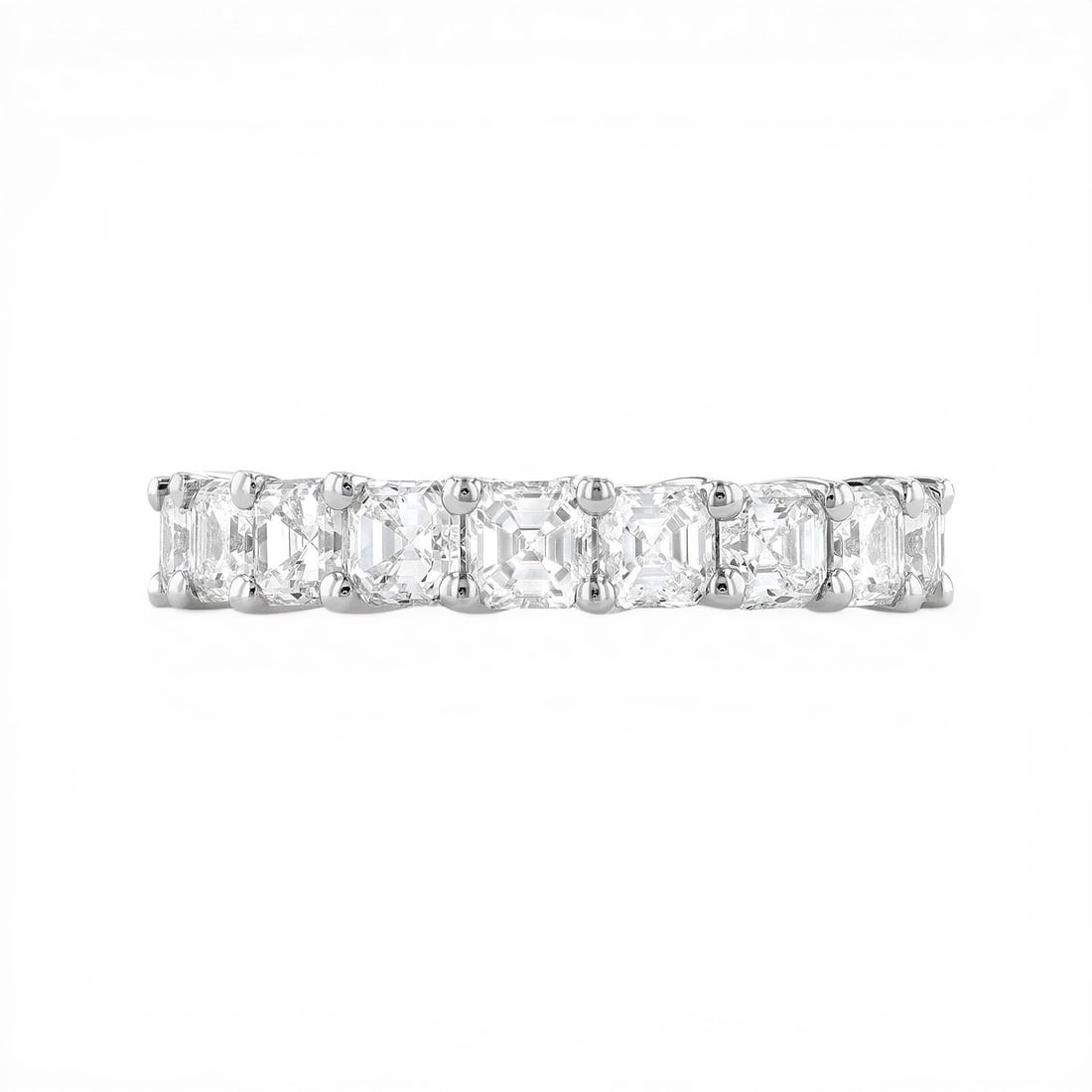 4.75 ctw Asscher Cut Diamond Eternity Band Platinum Ring: A vision of luxury, this magnificent Asscher Cut ring featuring White Diamond defines sophistication. The gemstones are nestled within an Eternity Band framework, supported by a substantial 5.0 g Plat