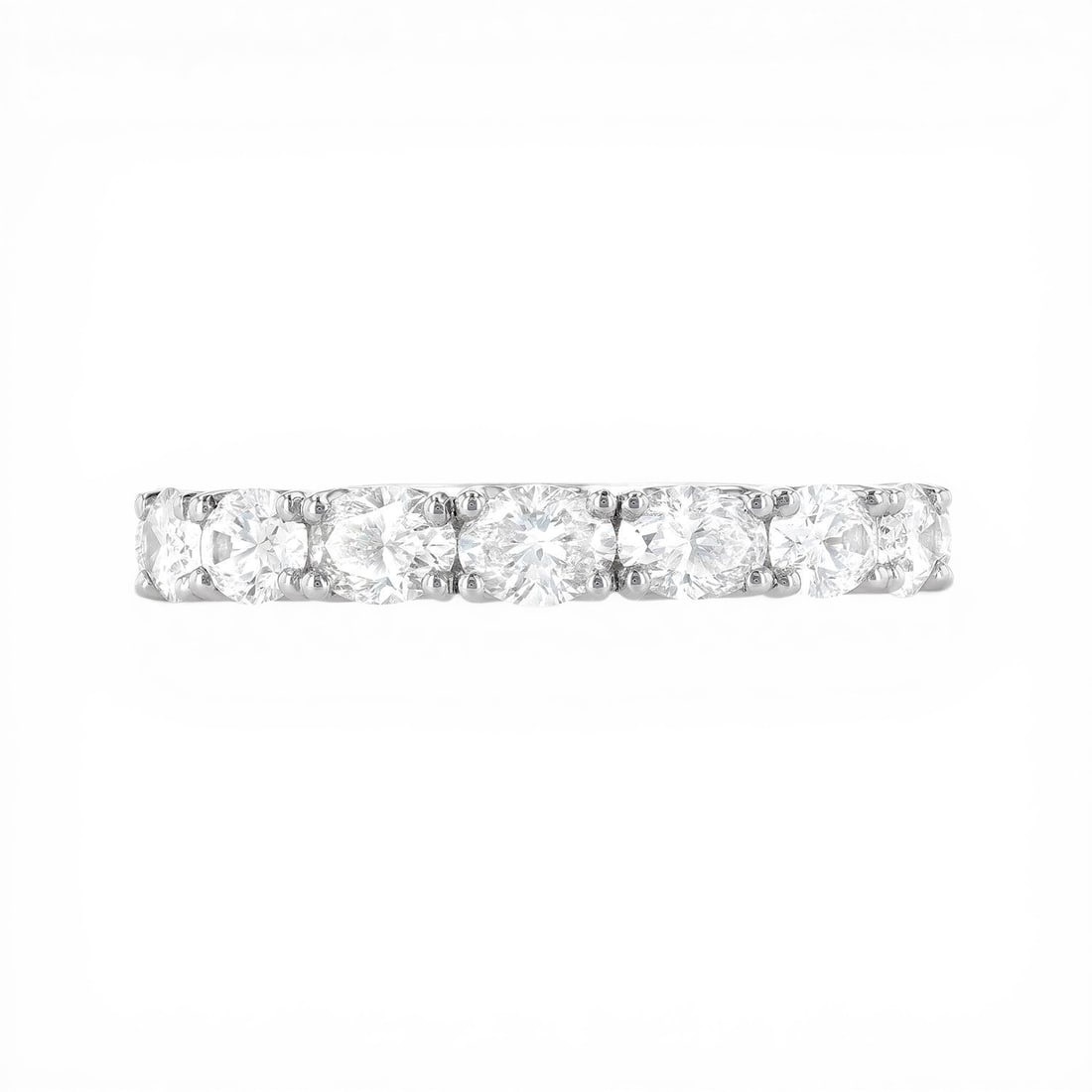 1.71 ctw Oval Diamond East-West 18K White Gold Band Ring: Captured in a moment of brilliance, this breathtaking East-West ring featuring White Diamonds speaks to the connoisseur. The gemstones are nestled within a Halfway Band framework, supported by a subst