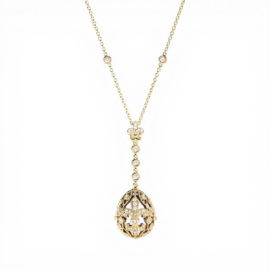1.26 ctw Diamond 18K Yellow & White Gold Pendant: Rare and radiant, this magnificent Cage Drop pendant featuring White Diamond offers a touch of the extraordinary. Crafted with precision, the Drop setting is seamlessly integrated into 9.0 grams of 18