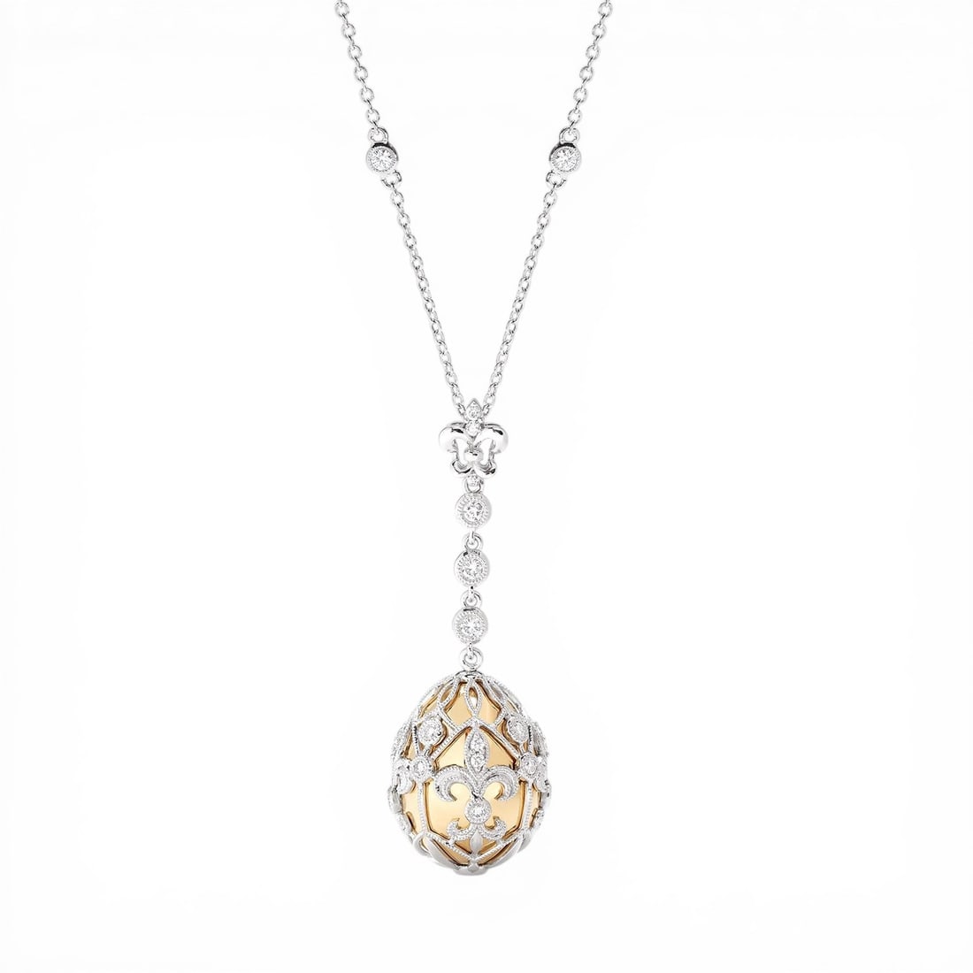 0.69 ctw White Diamond 18K Yellow & White Gold Pendant: Exuding opulence and grace, this luxurious Cage Drop pendant featuring Natural Diamonds is crafted for the distinguished. A detailed Drop Pendant with Cage Structure gallery secures the stones, render