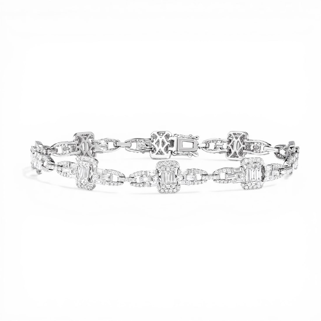 Empress 3.9 ctw Baguette & Round Diamond 18K White Gold Bracelet: Captured in a moment of brilliance, this magnificent Baguette Link bracelet featuring White Diamond speaks to the connoisseur. Expertly mounted in a Link setting, the bracelet is crafted in 14.9 grams