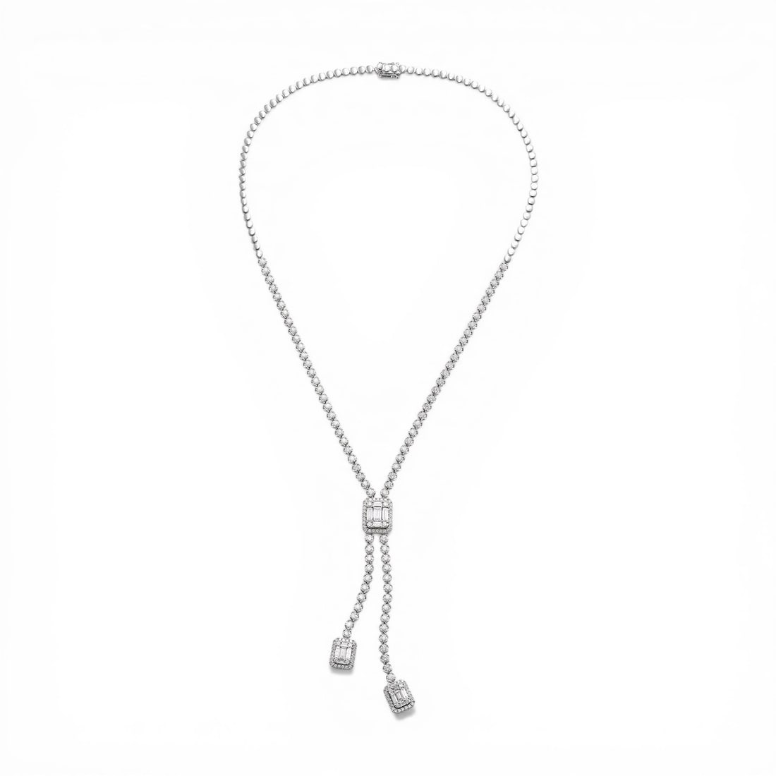 6.75 ctw Baguette & Round Diamond 18K White Gold Lariat Necklace: Rare and radiant, this breathtaking Architectural Lariat Necklace featuring White Diamond offers a touch of the extraordinary. Crafted with precision, the Lariat setting is seamlessly integrated into 