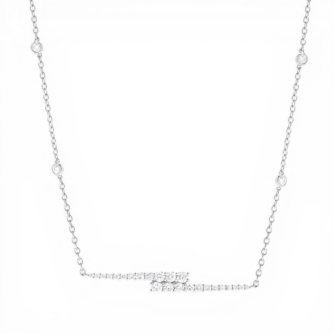 0.96 ctw Pave Criss-Cross Diamond 18K White Gold Necklace: A testament to superior craftsmanship, this breathtaking Criss-Cross necklace featuring Natural Diamonds is unparalleled. Showcasing the gems in a Pave Bar arrangement, the necklace consists of 1.05 g