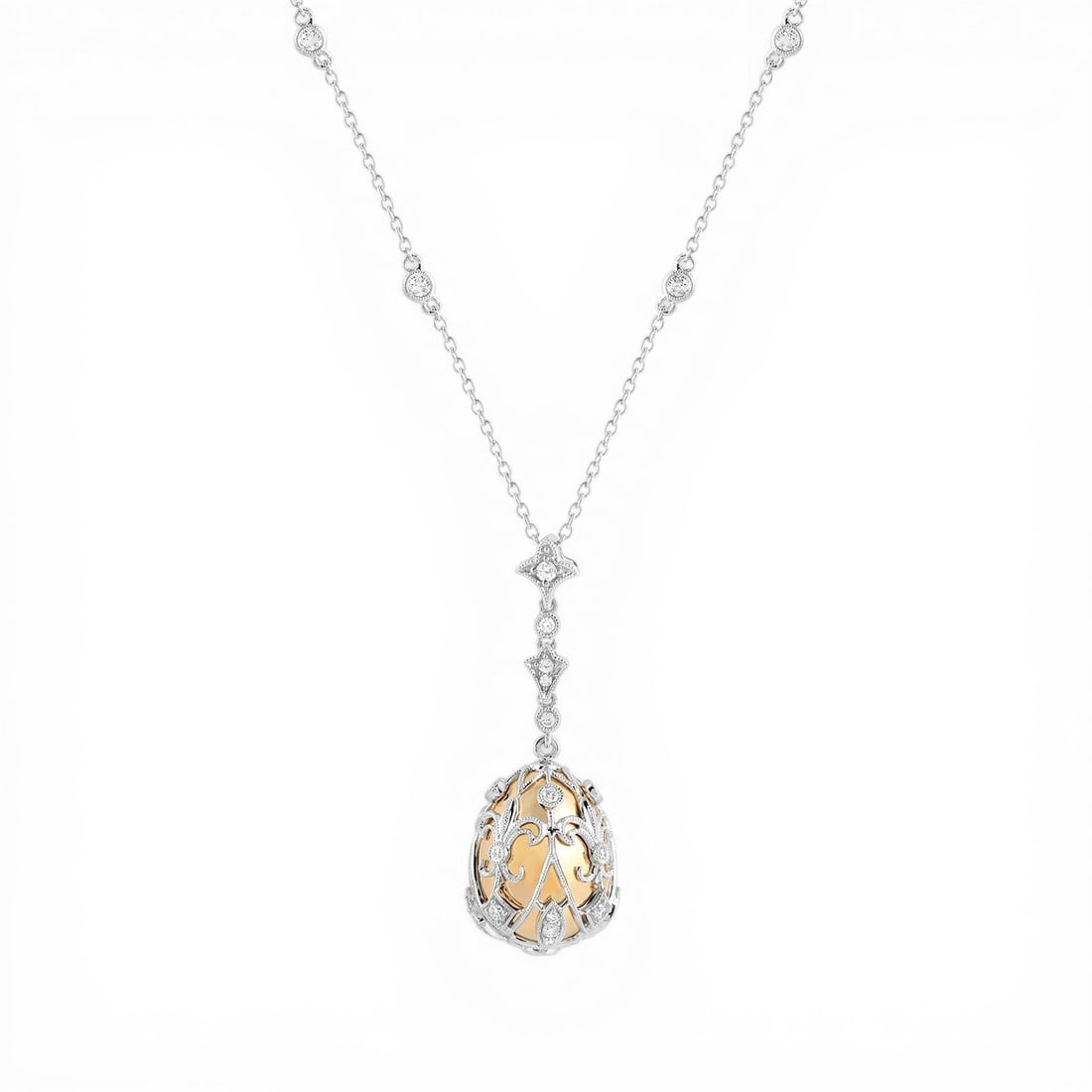 0.72 ctw Diamond Cage Drop 18K Yellow & White Gold Pendant: Timeless and sophisticated, this breathtaking Cage Drop pendant featuring White Diamond radiates enduring beauty. Securely held in a classic Cage/Filigree design, the pendant is forged from 7.0 grams 