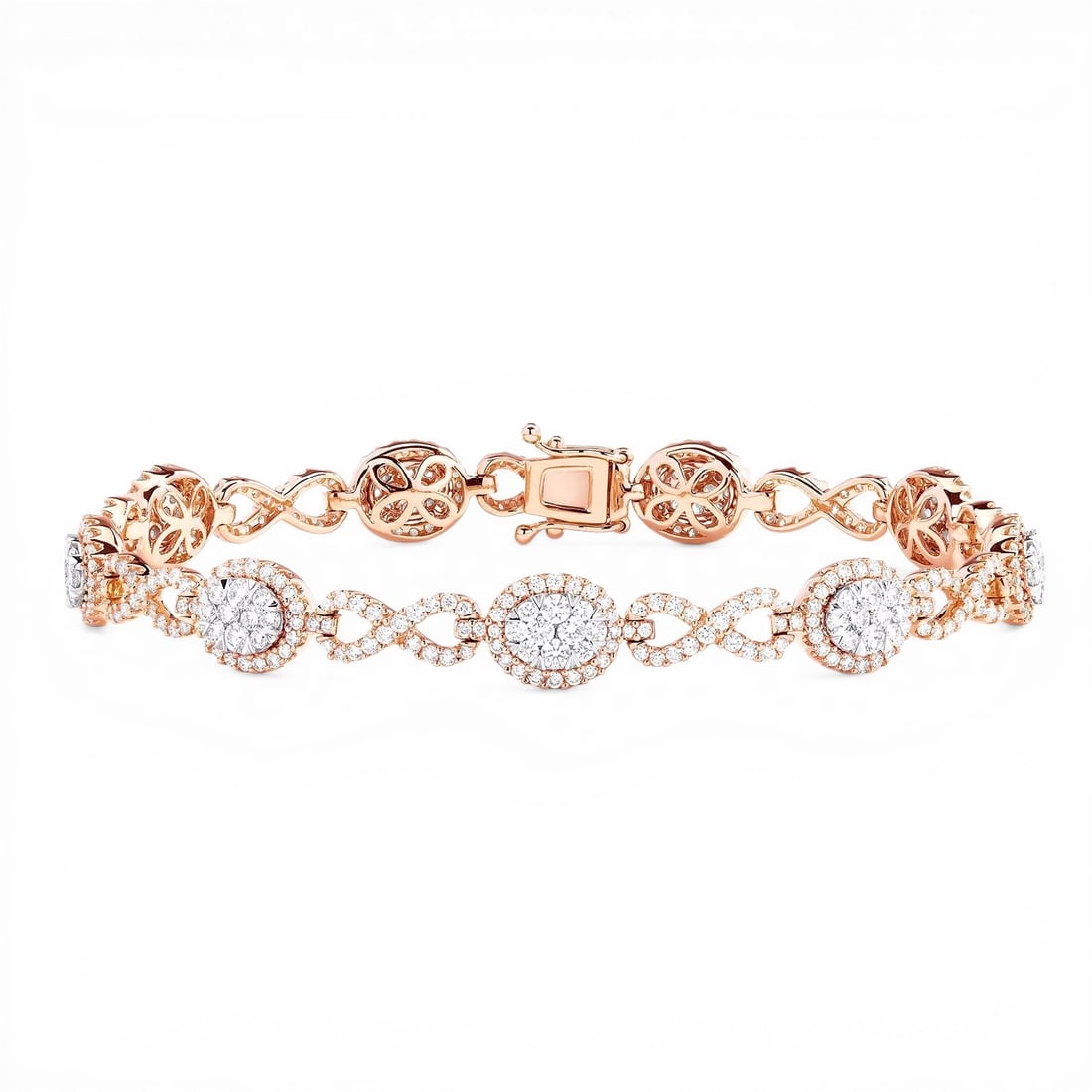3.06 ctw Diamond Fiori Infinity Alternating 18K Rose & White Gold Bracelet: Epitomizing grandeur, this magnificent Fiori Oval And Infinity Alternating bracelet featuring White Diamond stands as a beacon of refined taste. Showcasing the gems in a Cluster arrangement, the brace