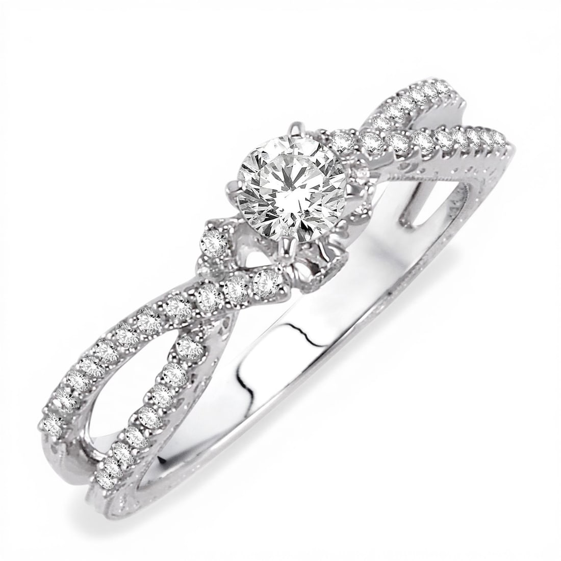 0.51 ctw Diamond 14K White Gold Engagement Ring: Exuding opulence and grace, this opulent Split-Shank Crossover ring featuring White Diamond is crafted for the distinguished. Showcasing the gems in a Split-Shank Crossover arrangement, the ring consi