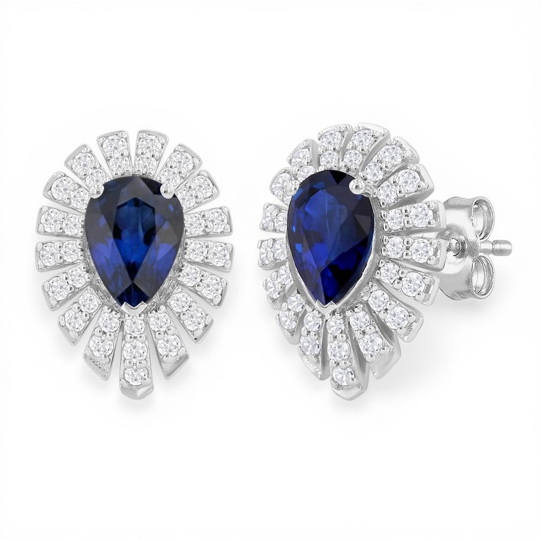5x3mm Pear Sapphire Starburst 0.31 ctw Diamond 14K White Gold Stud Earrings: Rare and radiant, this stunning Starburst pair of earrings featuring Blue Sapphire, White Diamond offers a touch of the extraordinary. A detailed Halo gallery secures the stones, rendered in 2.0 g of 