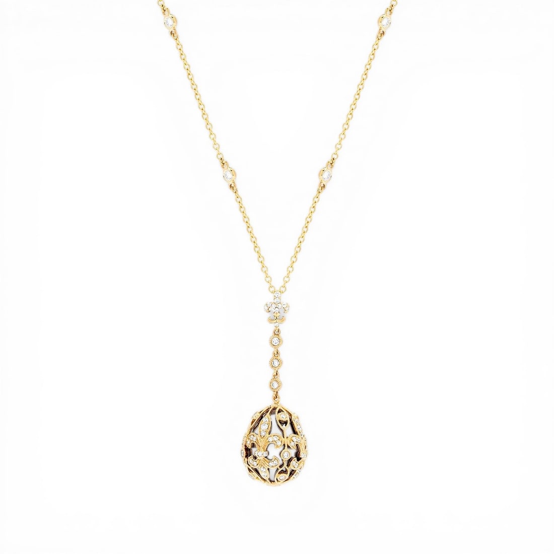 0.79 ctw Diamond Mademoiselle Egg 18K Yellow & White Gold Pendant Necklace: A vision of luxury, this exquisite Egg necklace featuring White Diamond defines sophistication. The gemstones are nestled within a Cluster framework, supported by a substantial 6.0 grams 18K Yellow & 