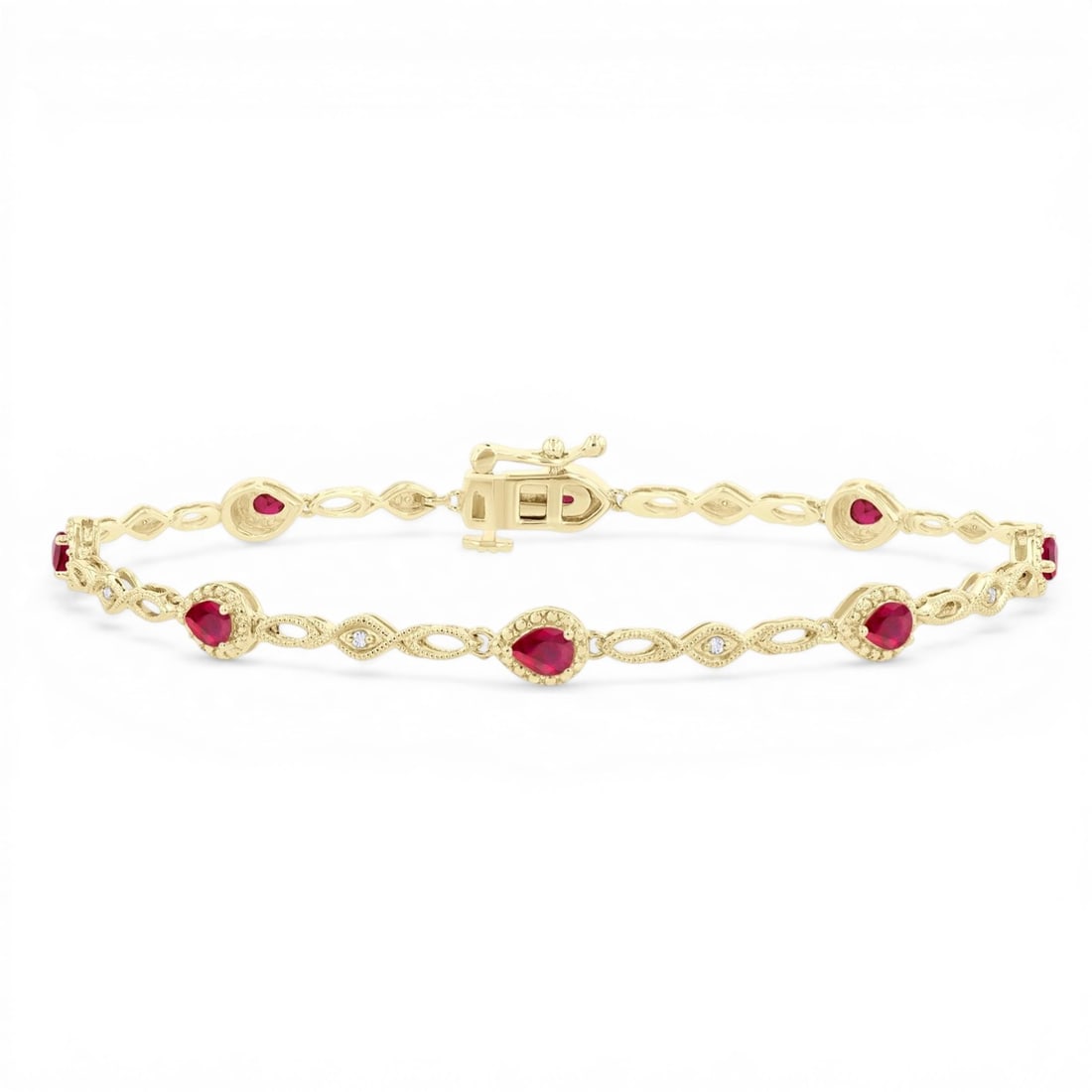 4x3mm Pear Ruby and 0.05 ctw Diamond 10K Yellow Gold Bracelet: Defining modern elegance, this magnificent Pear Cut bracelet featuring Ruby, White Diamond captures the essence of style. Securely held in a classic Bezel design, the bracelet is forged from 6.9 grams