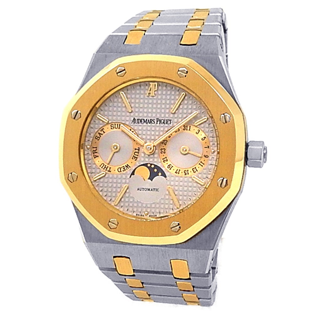 Audemars Piguet Royal Oak Day-Date 25594SA Gold & Steel Grey Dial: This Audemars Piguet Royal Oak Day-Date (Ref. 25594SA.OO.0789SA.01) represents a masterful fusion of precious metal and industrial strength, a hallmark of this legendary collection. The 36mm case is e