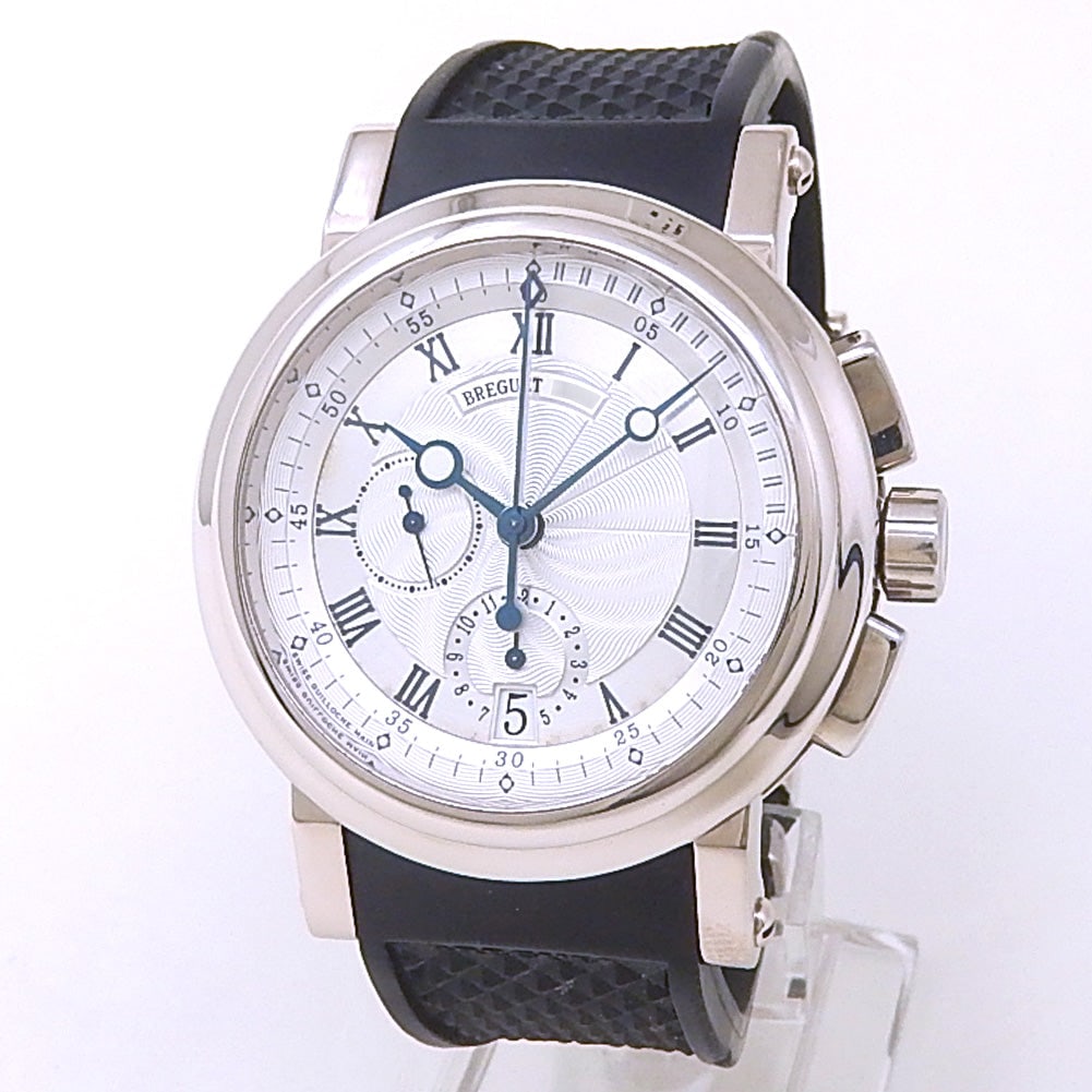 Breguet Marine Chronograph 5827BB/12/5ZU 18k White Gold Silver Dial: The Breguet Marine Chronograph reference 5827BB/12/5ZU represents a masterful blend of nautical heritage and haute horlogerie. Encased in lustrous 18k white gold, this timepiece features a stunning si