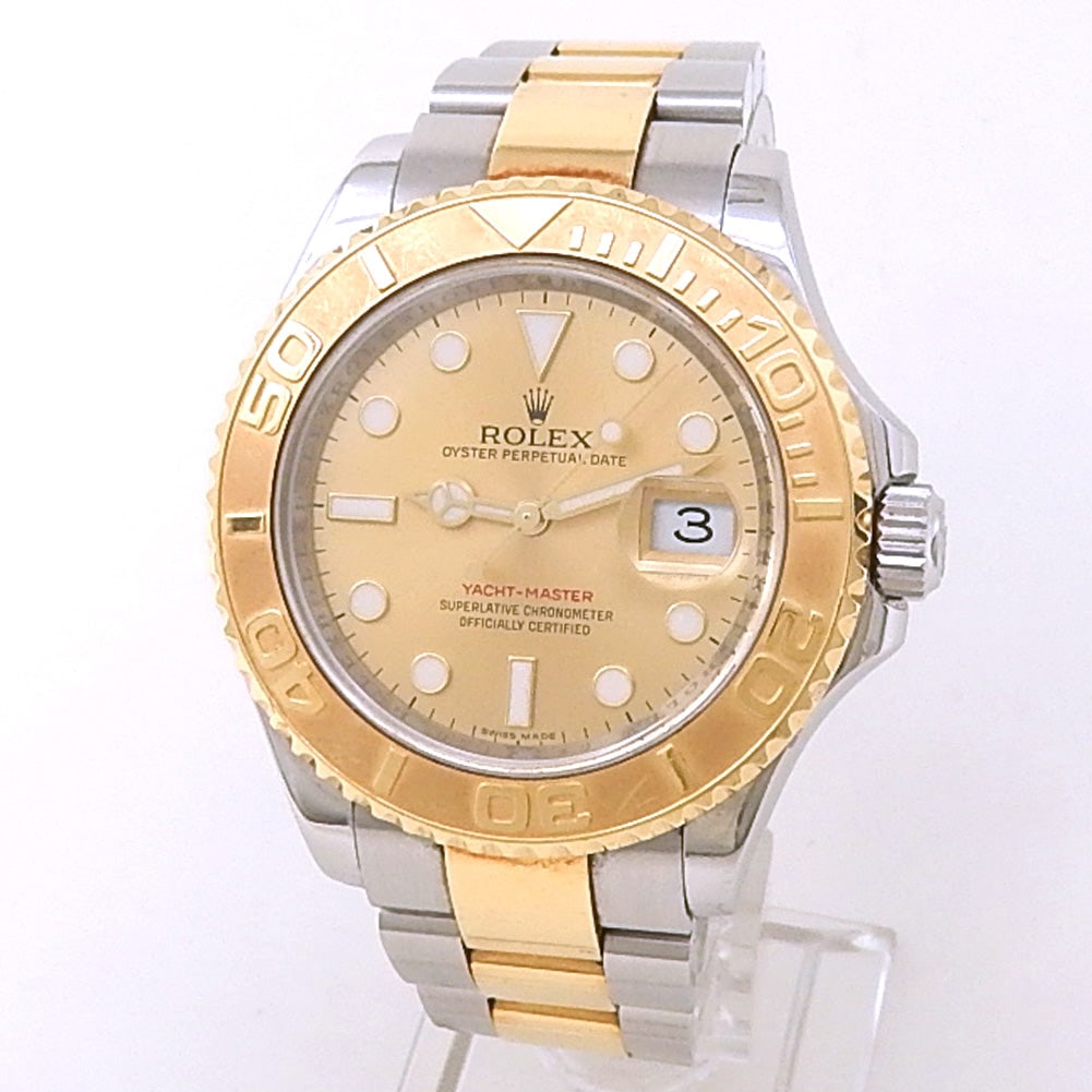 Rolex Yacht-Master 16623 18k Yellow Gold and Stainless Steel Champagne Dial: The Rolex Yacht-Master 16623 embodies the spirit of the open seas, merging nautical performance with the prestige of 18k yellow gold and stainless steel. This distinguished timepiece features a 40mm R