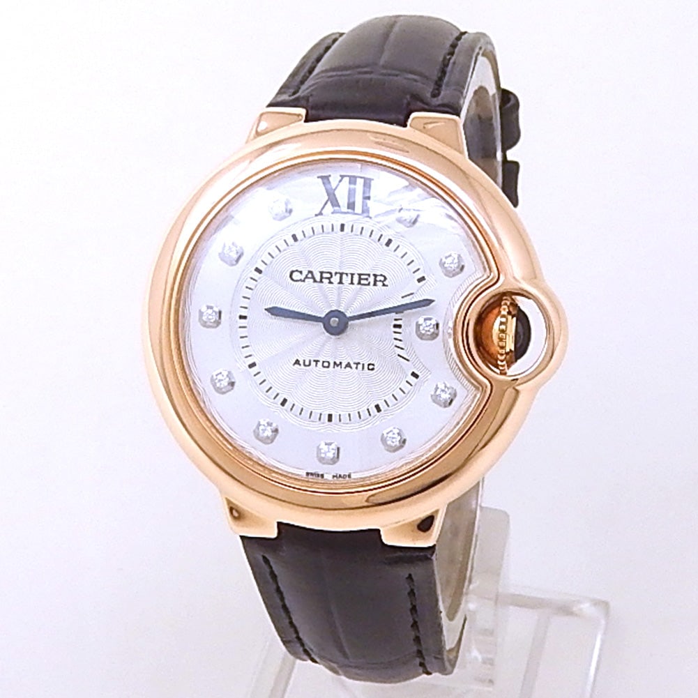 Cartier Ballon Bleu WE902040 18k Rose Gold Silver Diamond Dial: The Cartier Ballon Bleu WE902040 is a testament to the Maison's ability to blend sculptural design with horological refinement. This exquisite timepiece is crafted from 18k Rose Gold, featuring a poli