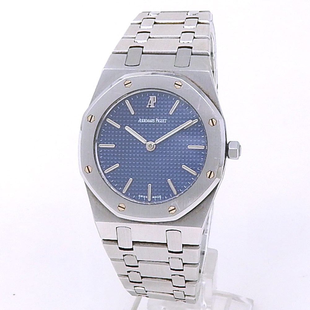 Audemars Piguet Royal Oak 56303ST Steel Blue Dial: This exceptional Audemars Piguet Royal Oak 56303ST represents a masterclass in horological design, featuring a durable stainless steel case and the legendary octagonal steel bezel. The watch is distin