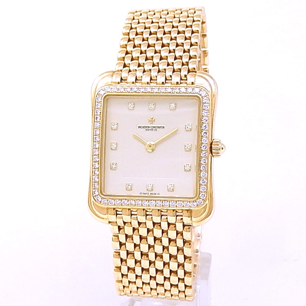 Vacheron Constantin Toledo VCT 18k Yellow Gold Diamond Dial: This exquisite Vacheron Constantin Toledo, reference VCT, represents a pinnacle of mid-century inspired elegance. Meticulously crafted from 18k yellow gold, the watch features a sophisticated tonneau-