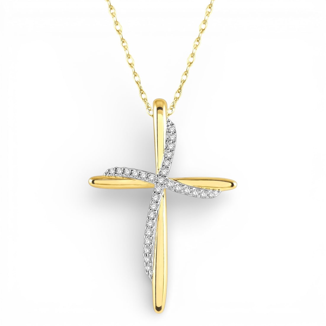 0.10 ctw White Diamond Draped Cross Charm 10K Yellow Gold Pendant: An exquisite masterpiece of haute joaillerie, this elegant Draped Cross Charm pendant featuring White Diamond is a true treasure. Showcasing the gems in a Draped/Overlay Cross arrangement, the pendant