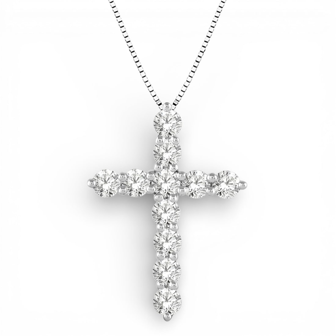 1.0 ctw Diamond Cross Pendant 14K White Gold with Chain: Exuding opulence and grace, this elegant Cross pendant featuring Natural Diamonds is crafted for the distinguished. Showcasing the gems in a Cluster arrangement, the pendant consists of 0.9 grams of 1