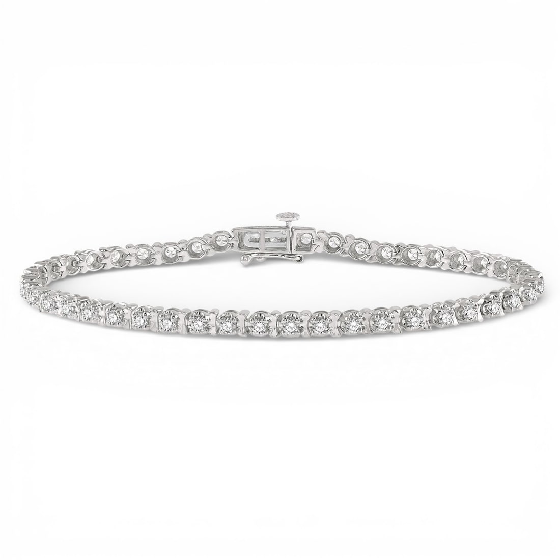 2.0 ctw Round Cut Diamond Tennis Tulip Bracelet 14K White Gold: Captured in a moment of brilliance, this exquisite Tulip bracelet featuring White Diamond speaks to the connoisseur. Securely held in a classic Tennis design, the bracelet is forged from 9.85 grams of