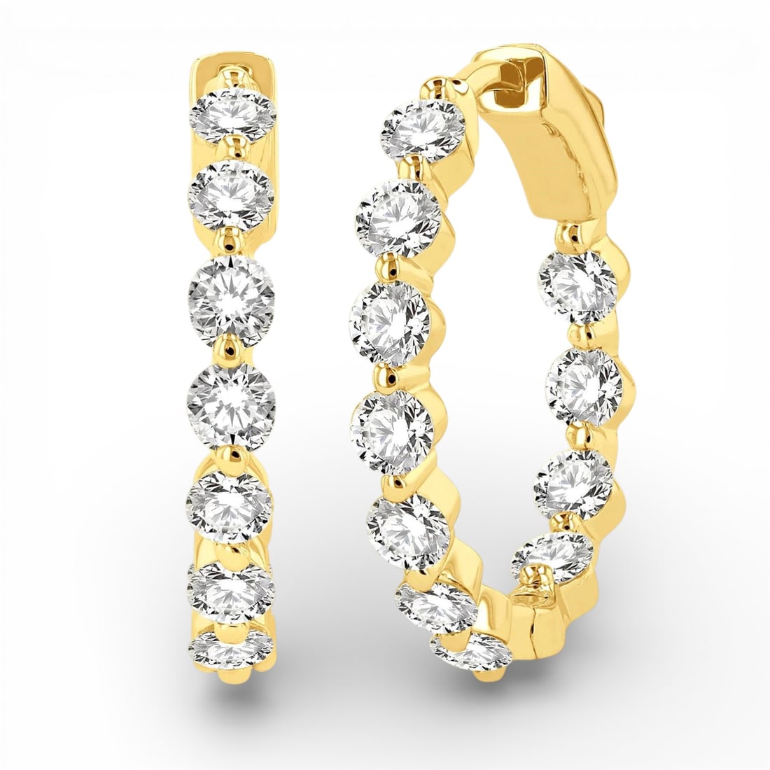 2.04 ctw Round Diamond Inside-Out 14K Yellow Gold Hoop Earrings: Defining modern elegance, this stunning Inside-Out pair of earrings featuring White Diamond captures the essence of style. Expertly mounted in a Hoop (Inside-Out) setting, the earrings are crafted in 
