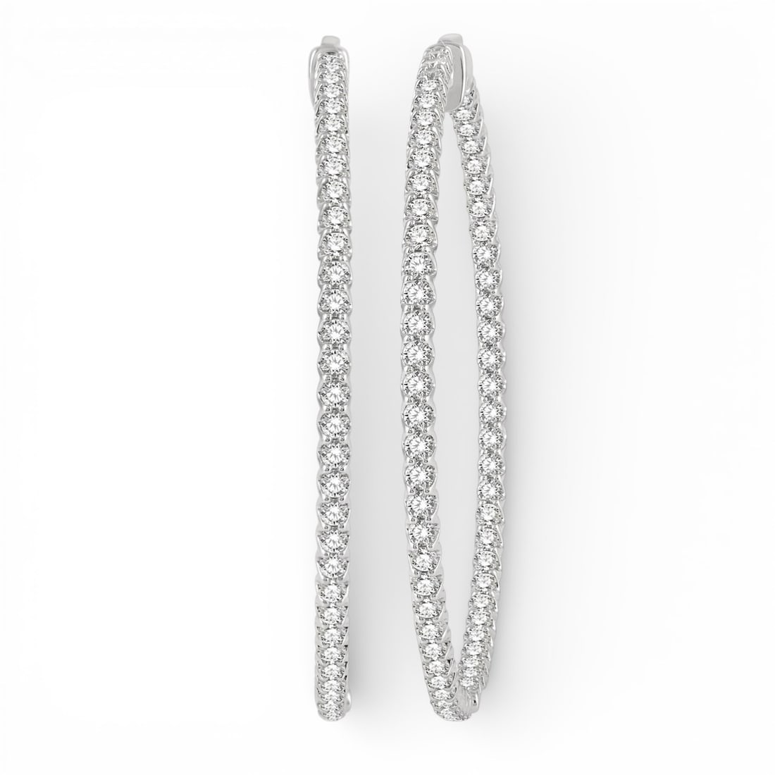 5.04 ctw Inside-Out Diamond Hoop Earrings 14K White Gold: Exuding opulence and grace, this breathtaking Inside-Out pair of earrings featuring White Diamond is crafted for the distinguished. Showcasing the gems in a Hoop arrangement, the earrings consists of 